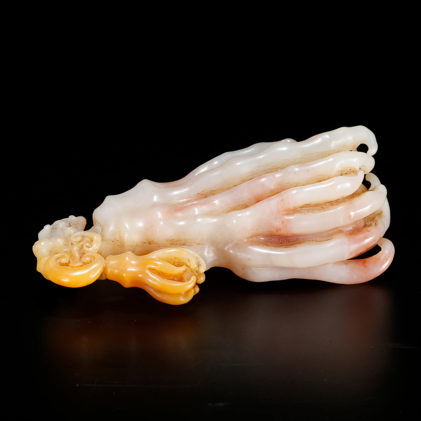 A BUDDHA'S HAND ORNAMENT CARVED FROM SHOUSHAN STONE: Buddha's Hand Ornament Carved from Shoushan Stone