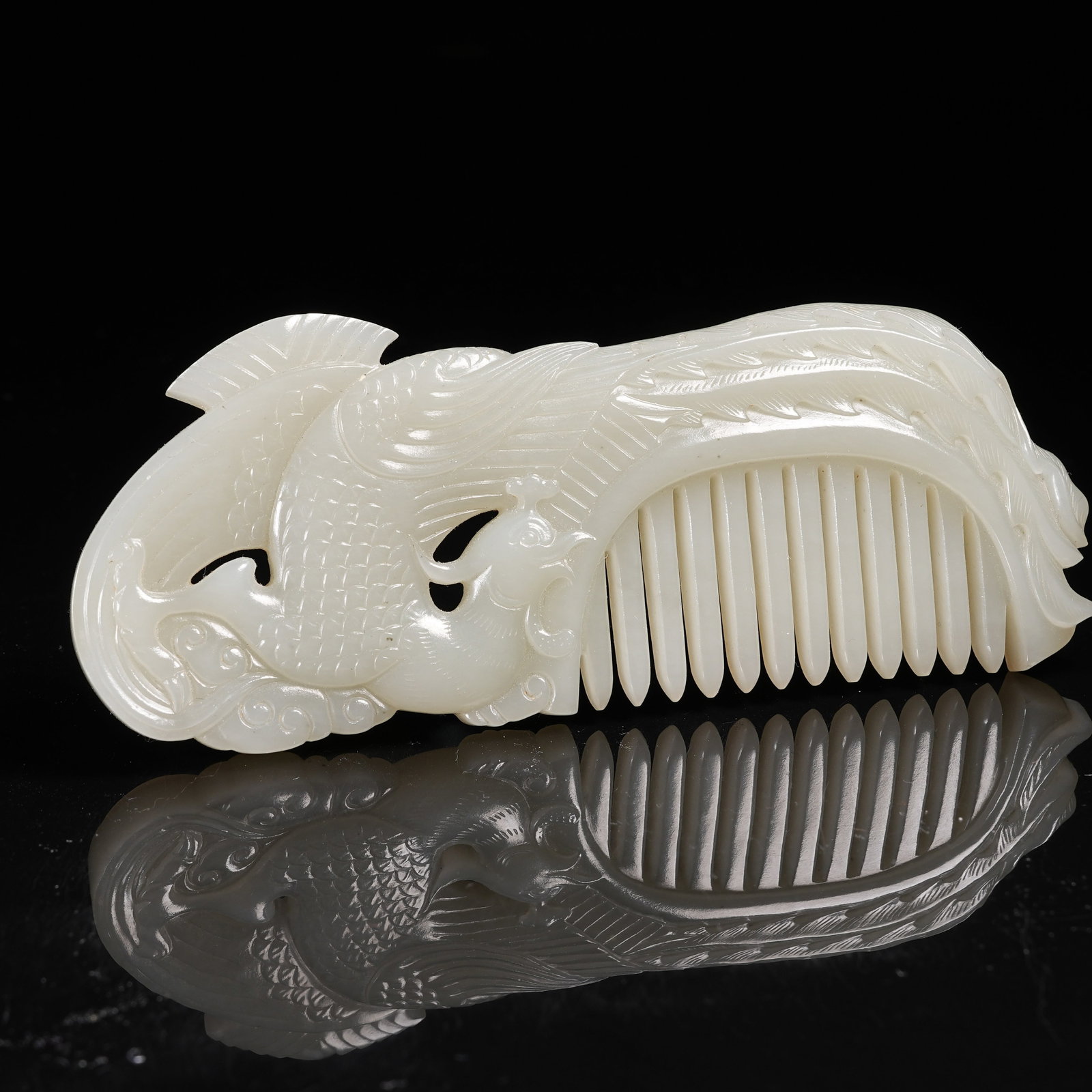 A HETIAN JADE COMB WITH PHOENIX MOTIF (1 of 9)