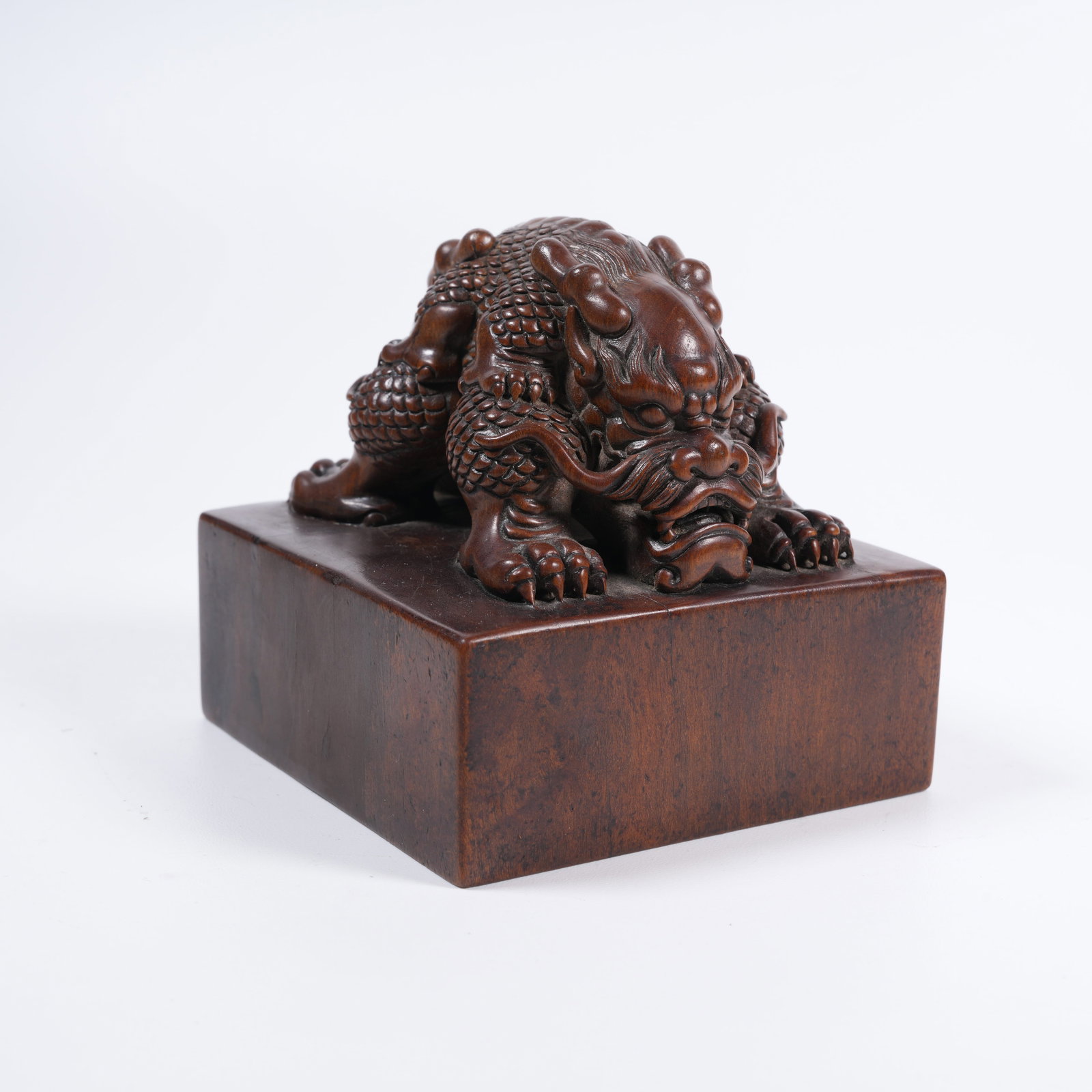 A SANDALWOOD SEAL WITH AUSPICIOUS BEAST KNOB: Sandalwood Seal with Auspicious Beast Knob