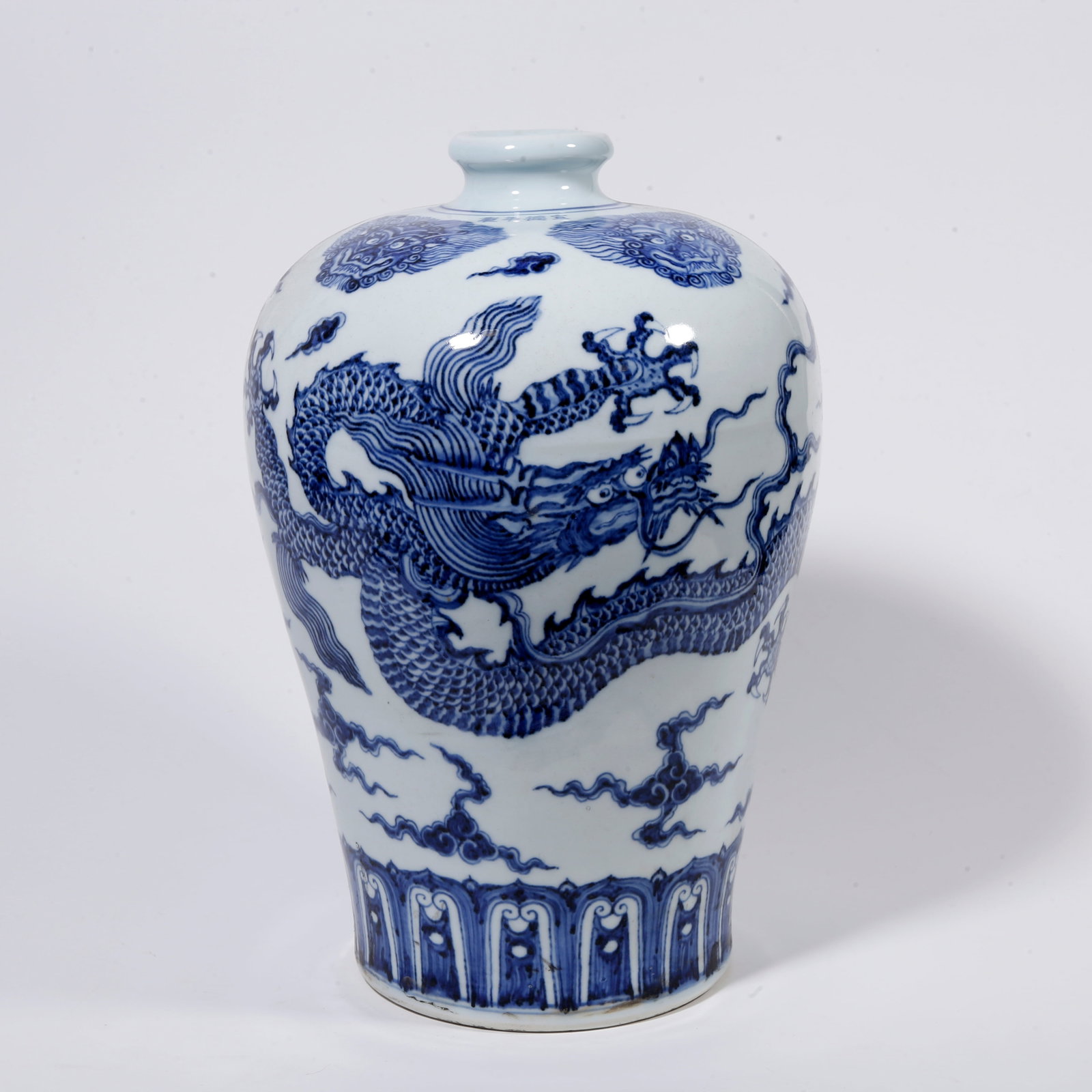 A BLUE AND WHITE PLUM VASE WITH CLOUD AND DRAGON PATTERN (1 of 9)