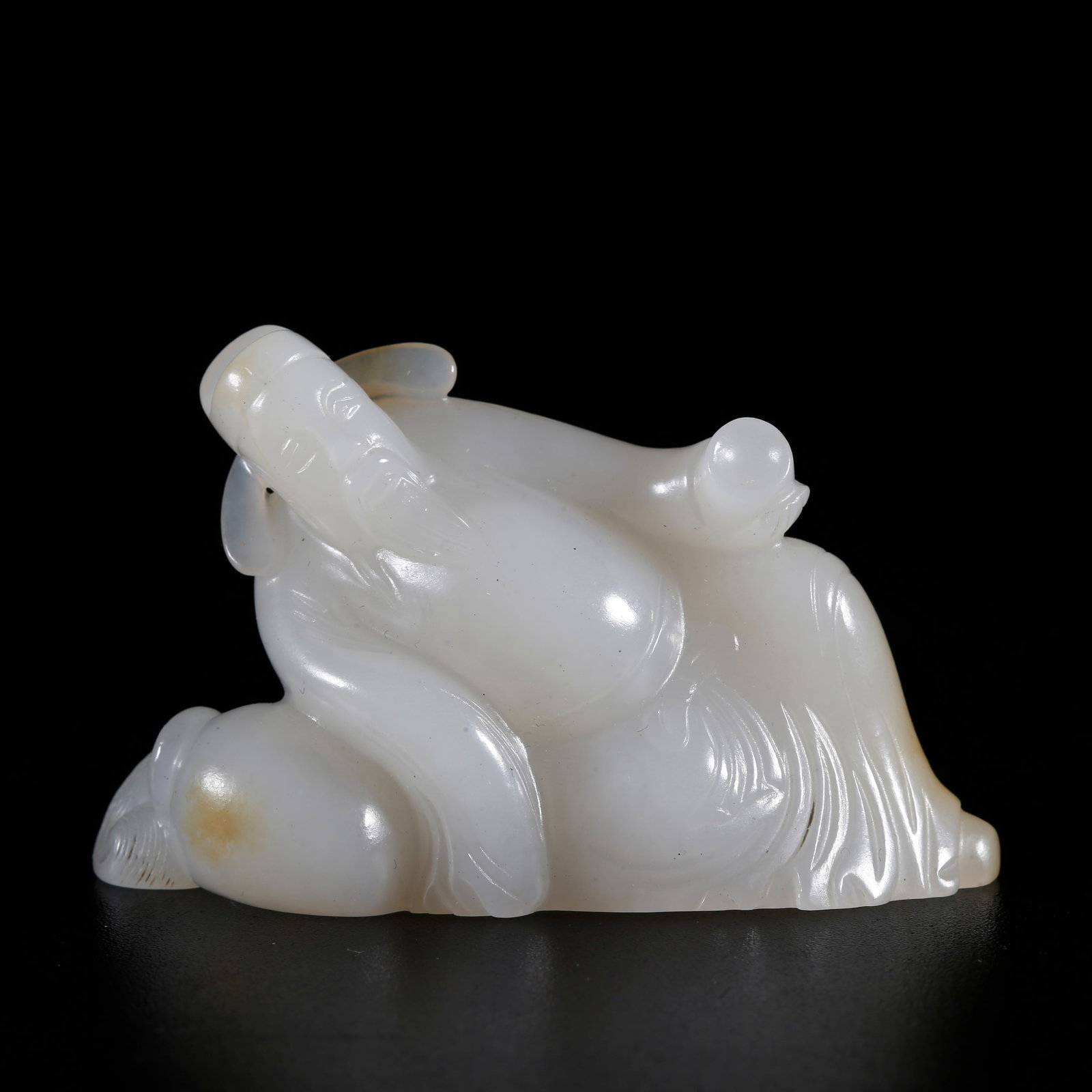 A HOTAN JADE CARVED DRUNKEN TAIBAI-SHAPED ORNAMENT (1 of 9)