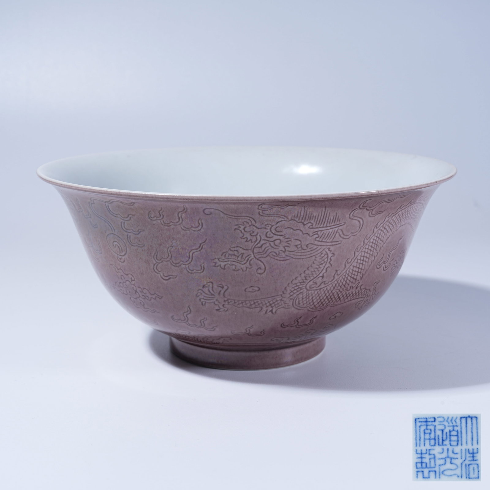 A RED GLAZE BOWL WITH CLOUD DRAGON CHASING PEARL PATTERN (1 of 9)