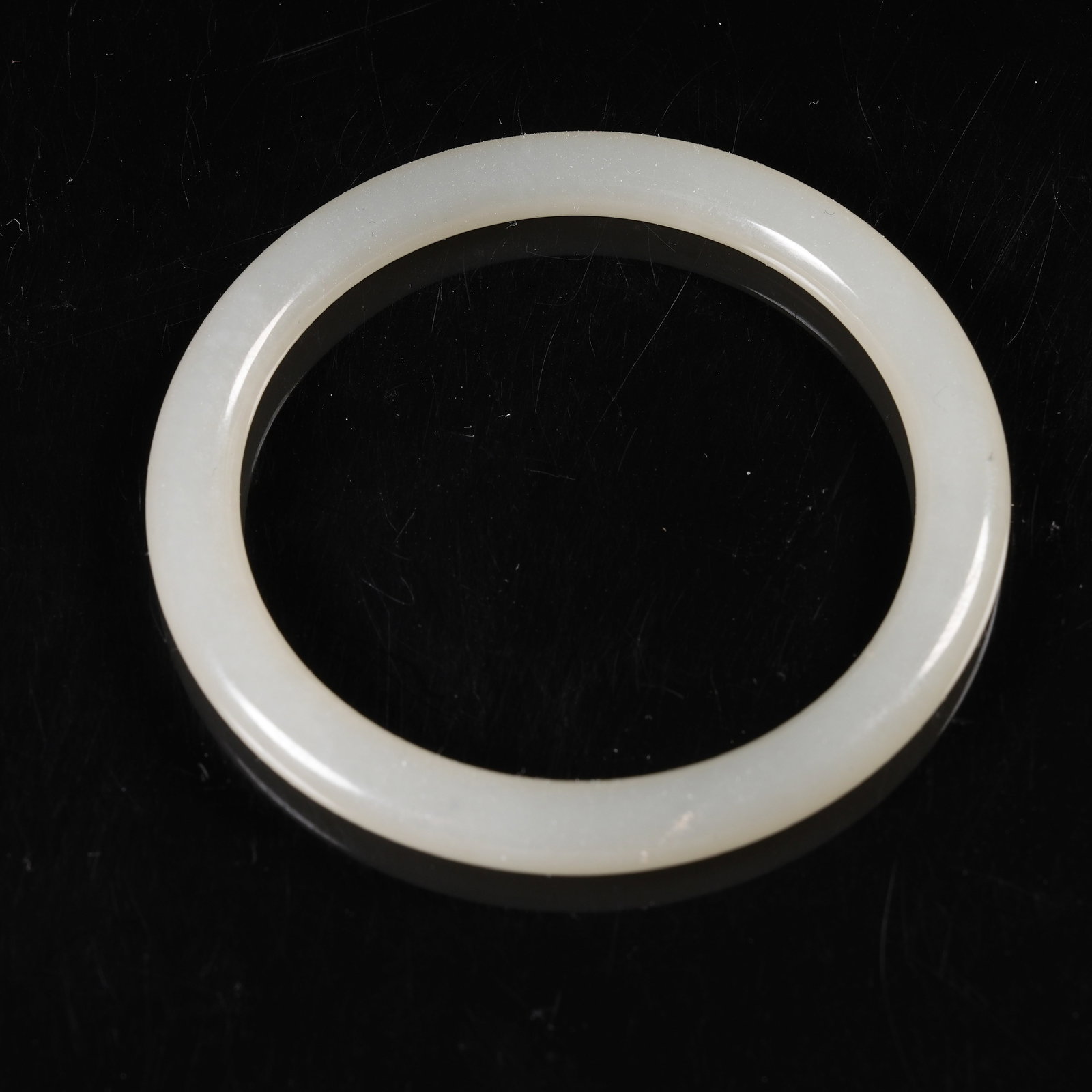 A HETIAN WHITE JADE RING: Hetian White Jade Ring