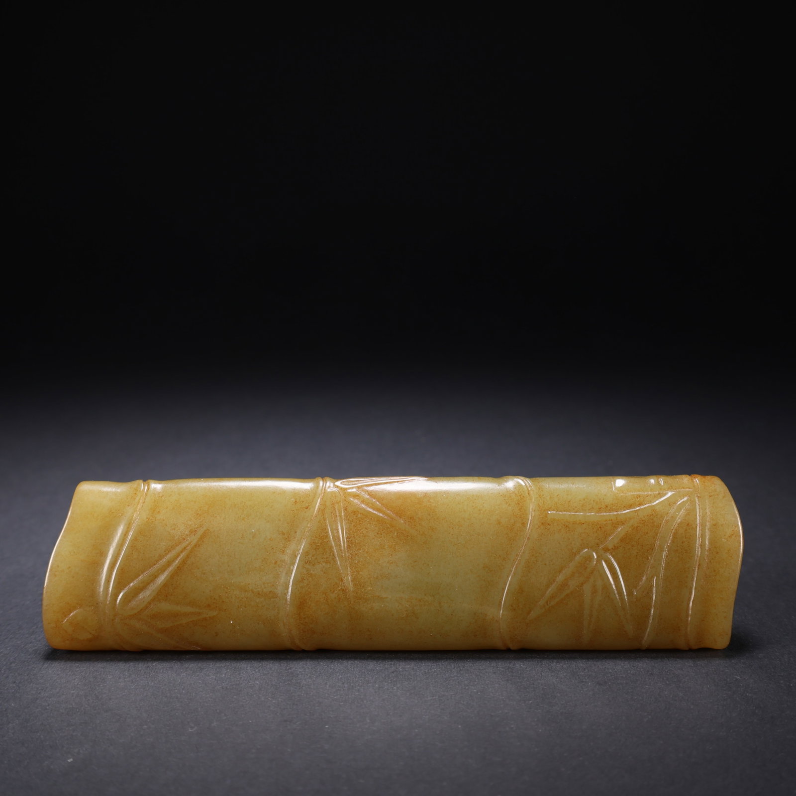 A HETIAN JADE BAMBOO-SECTION PAPERWEIGHT: Hetian Jade Bamboo-Section Paperweight