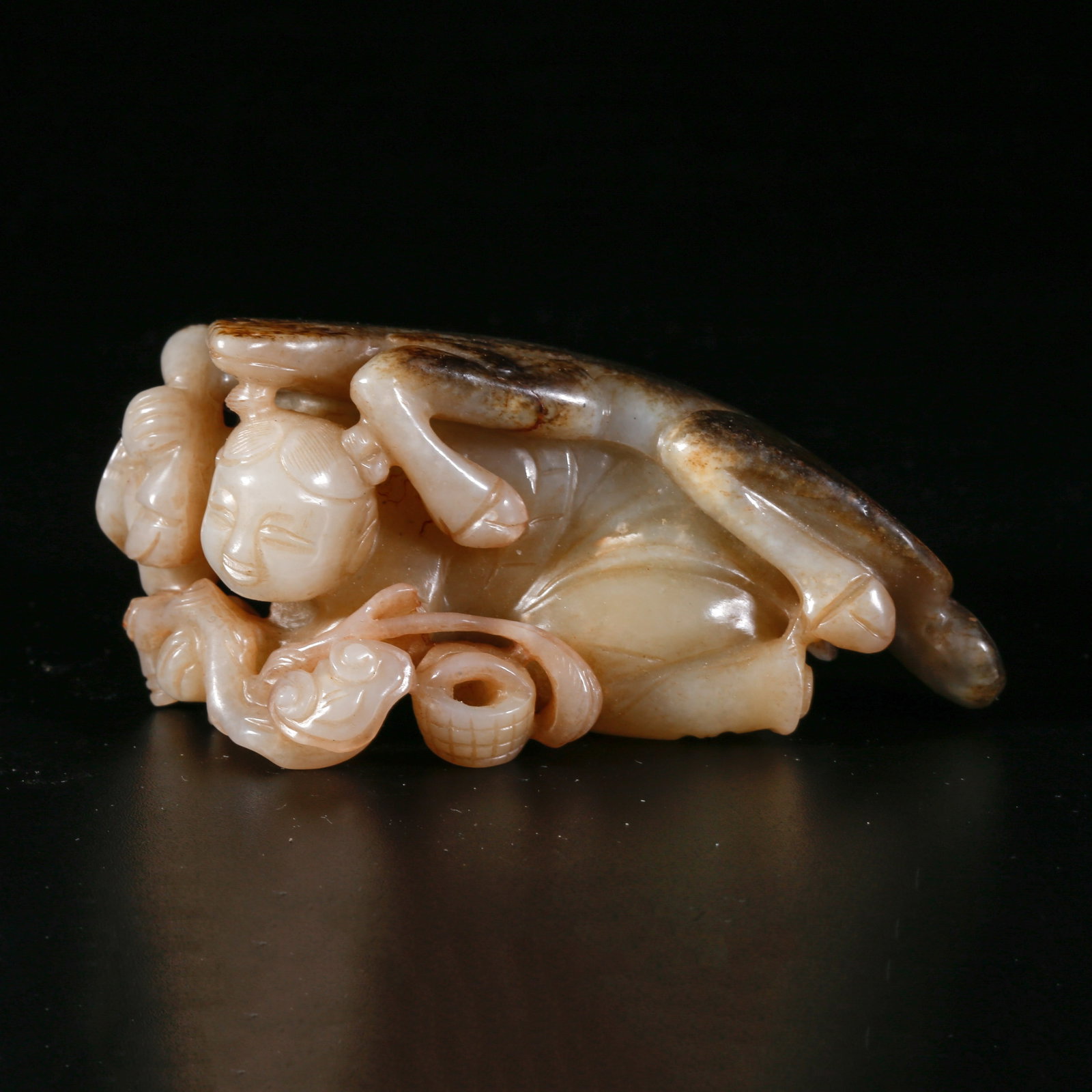 A HETIAN JADE CARVING OF CHILD FIGURINE (1 of 10)