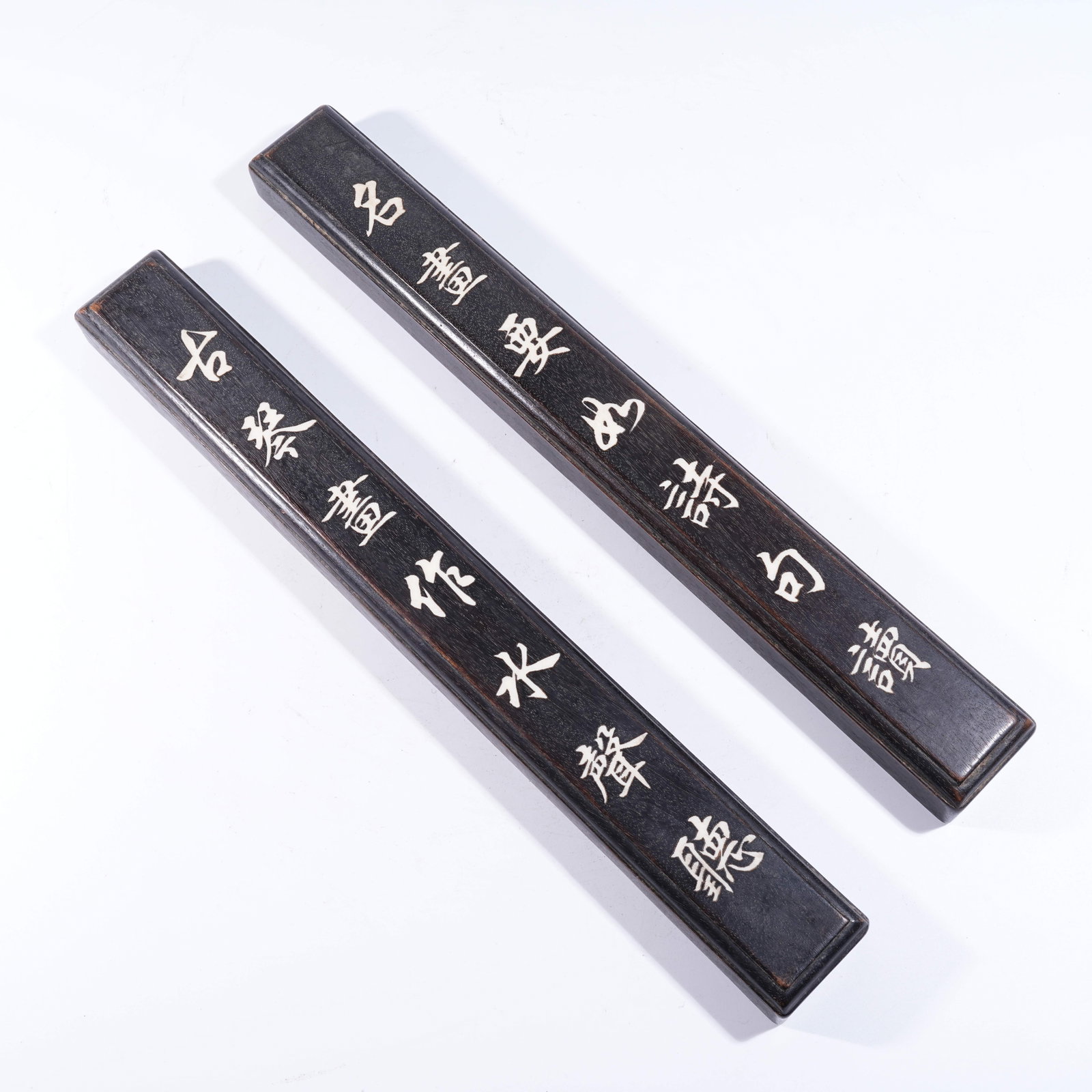 A SET OF ZITAN PAPERWEIGHTS INLAID WITH PRECIOUS MATERIALS (1 of 8)