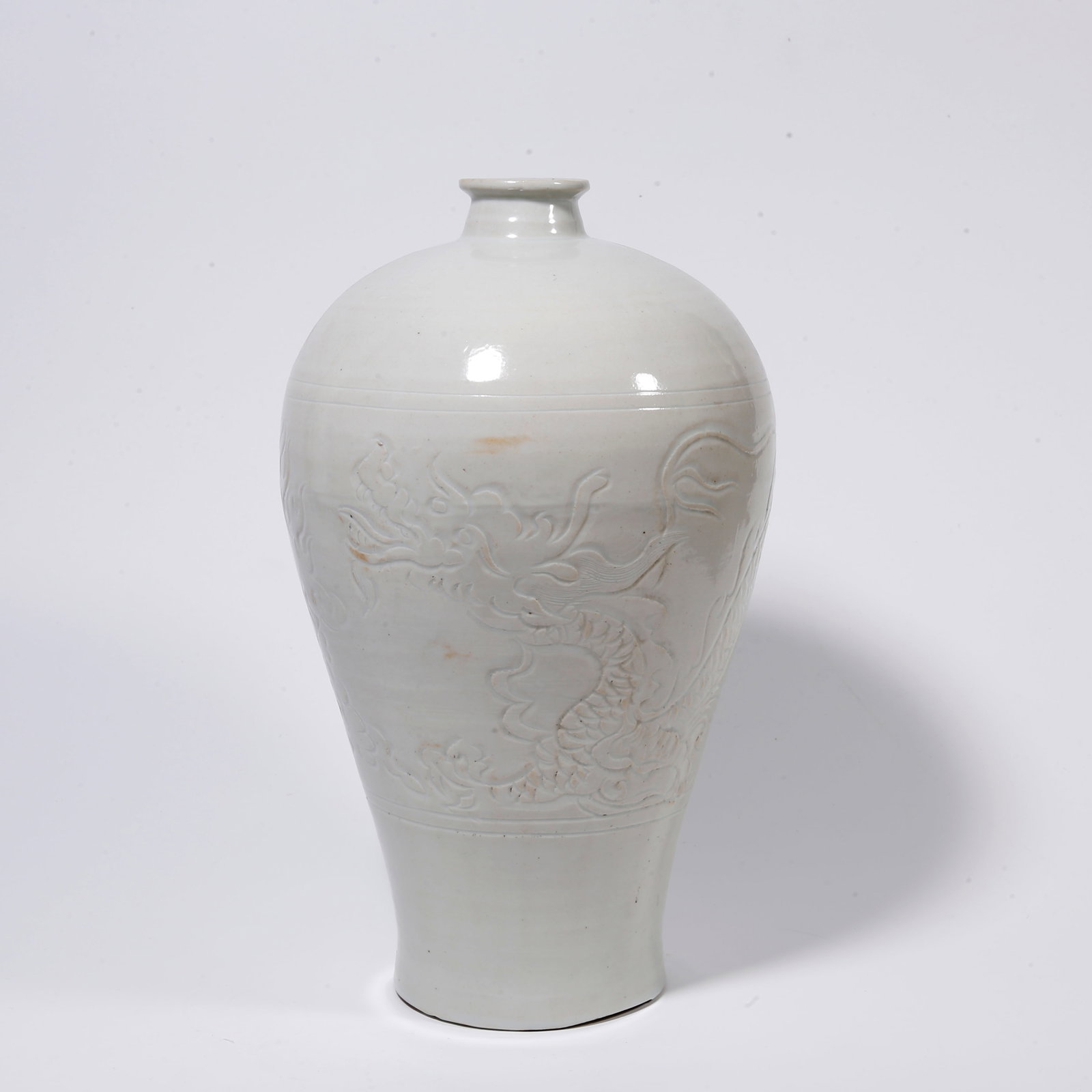 A DING WARE PLUM VASE WITH CLOUD AND DRAGON PATTERN (1 of 10)