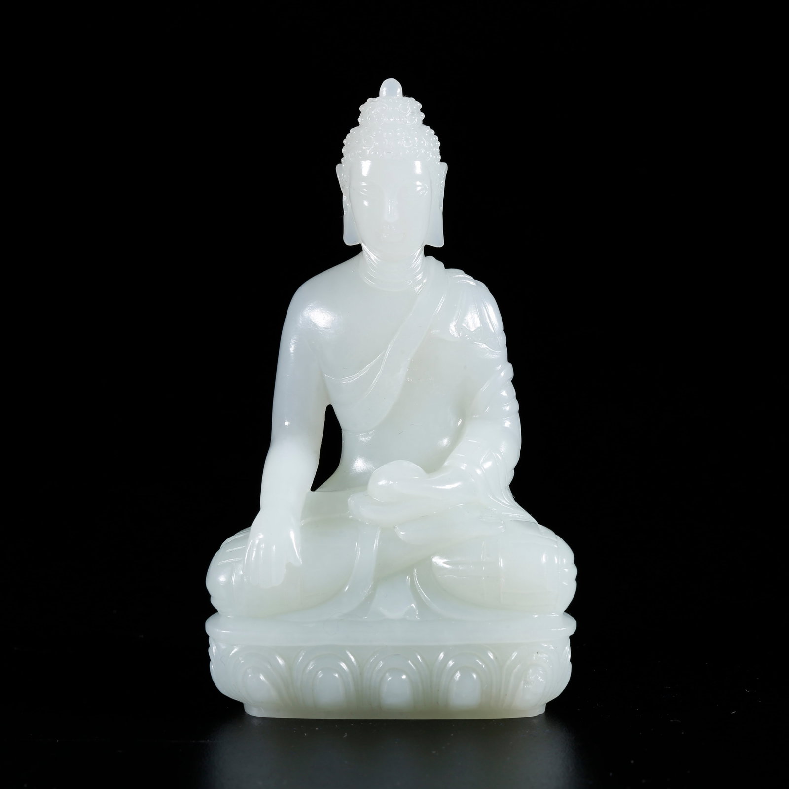 A HOTAN JADE CARVED SAKYAMUNI STATUE (1 of 9)