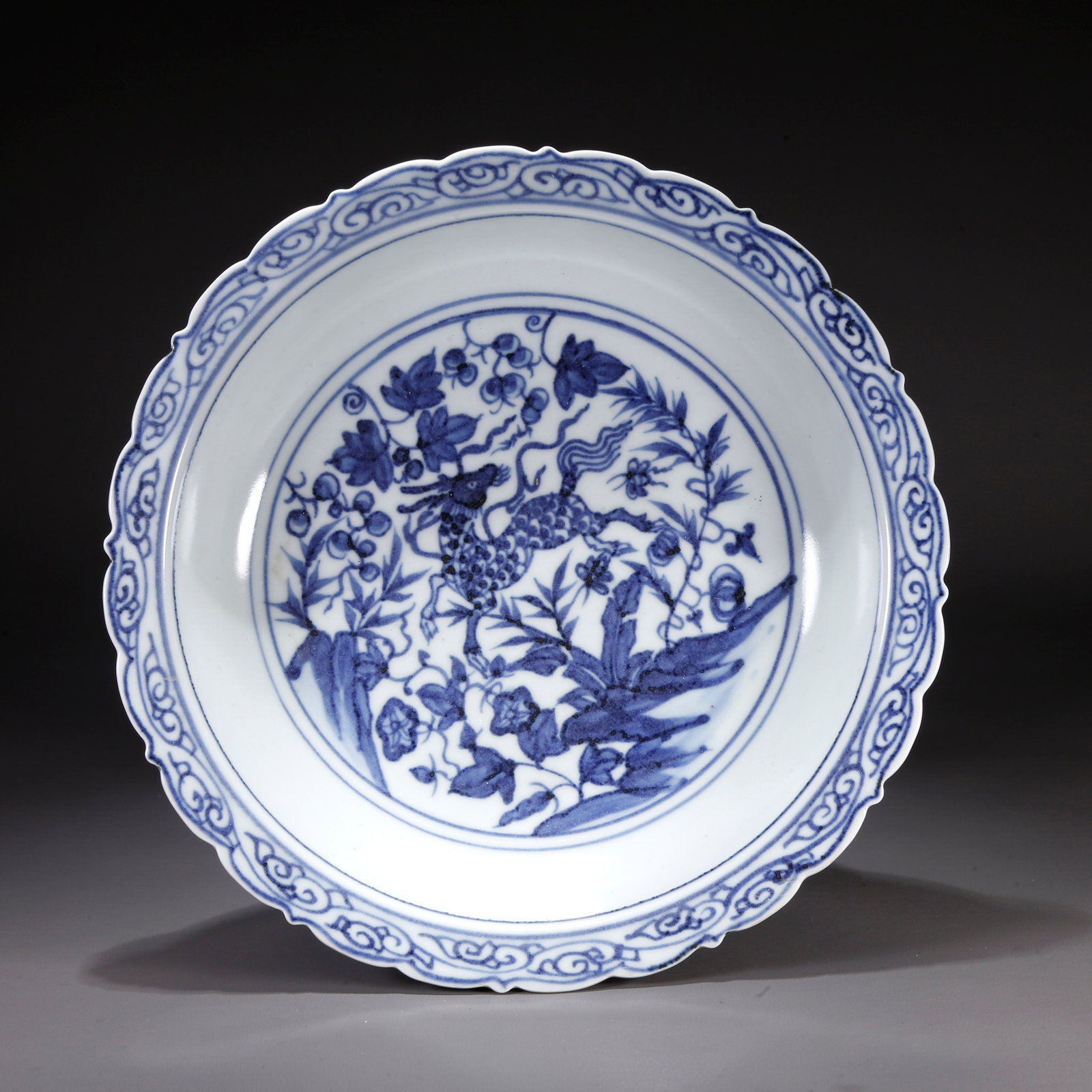 A BLUE AND WHITE WASHER WITH DEER PATTERN: Blue and White Washer with Deer Pattern
