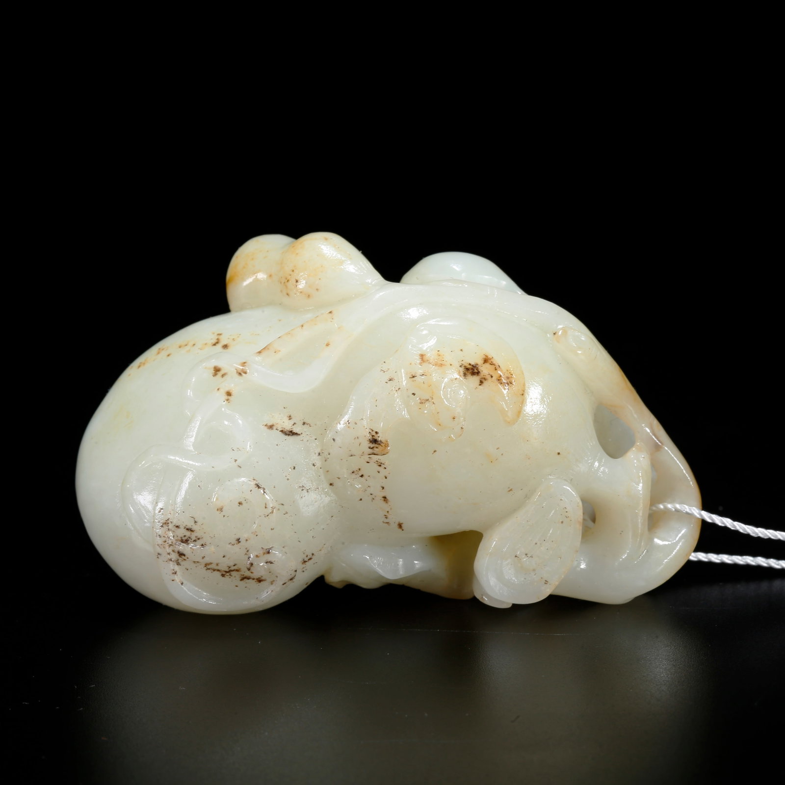 A HETIAN JADE GOURD-SHAPED HAND PIECE (1 of 10)