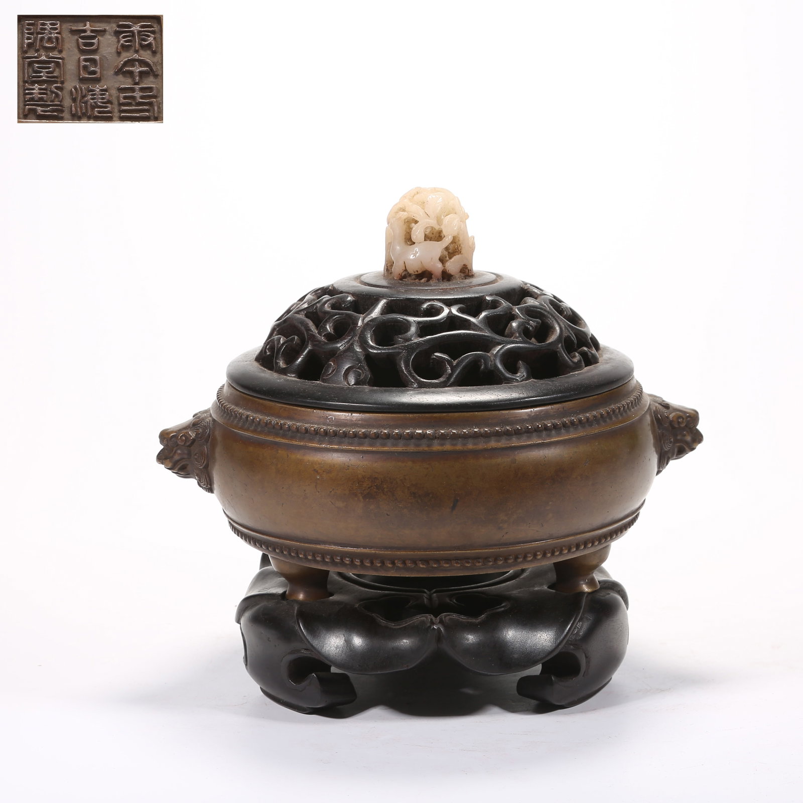 A BRONZE DRUM-SHAPED CENSER WITH LION HANDLES: Bronze Drum-Shaped Censer with Lion Handles