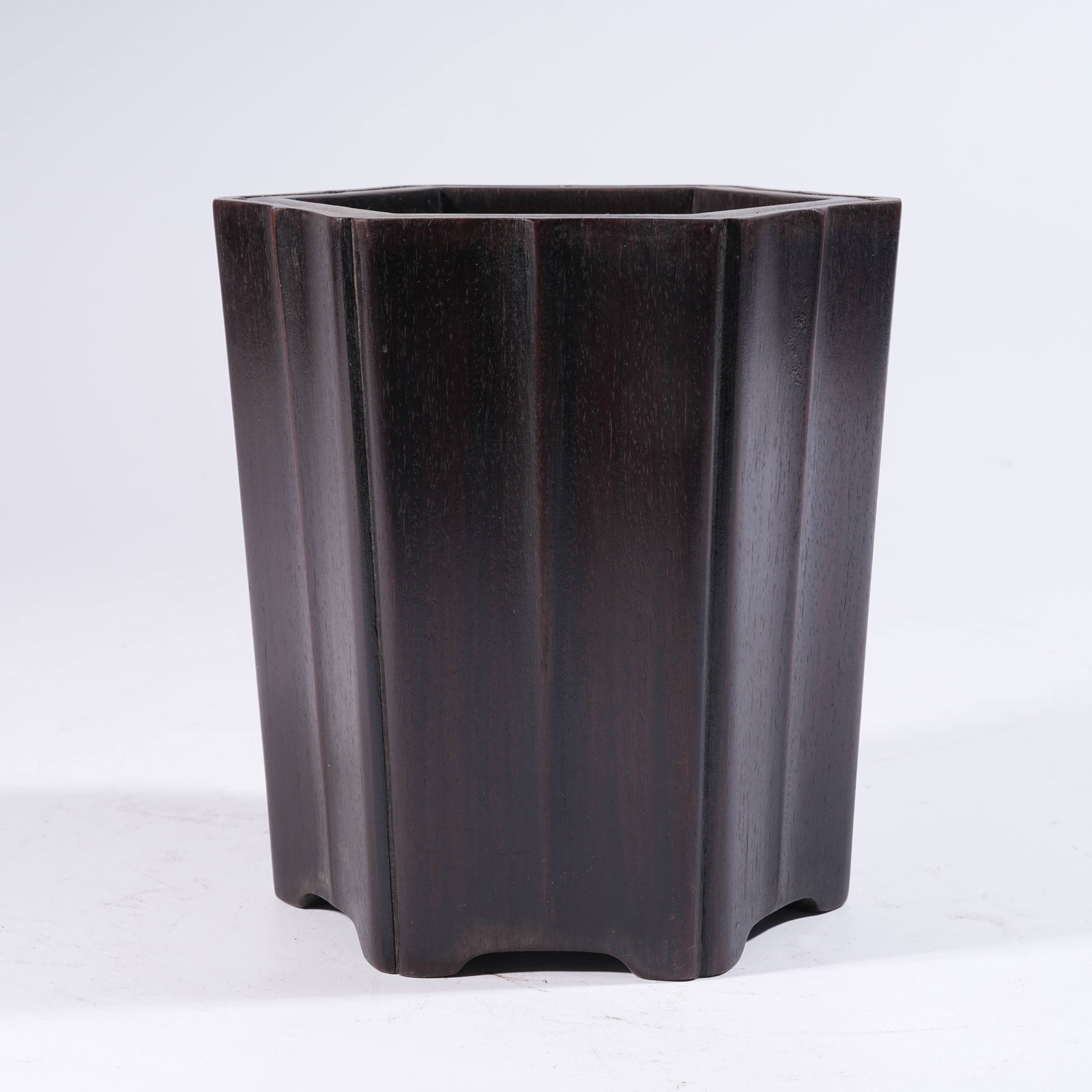 A HEXAGONAL CHAMFERED BRUSH POT IN ZITAN WOOD (1 of 9)