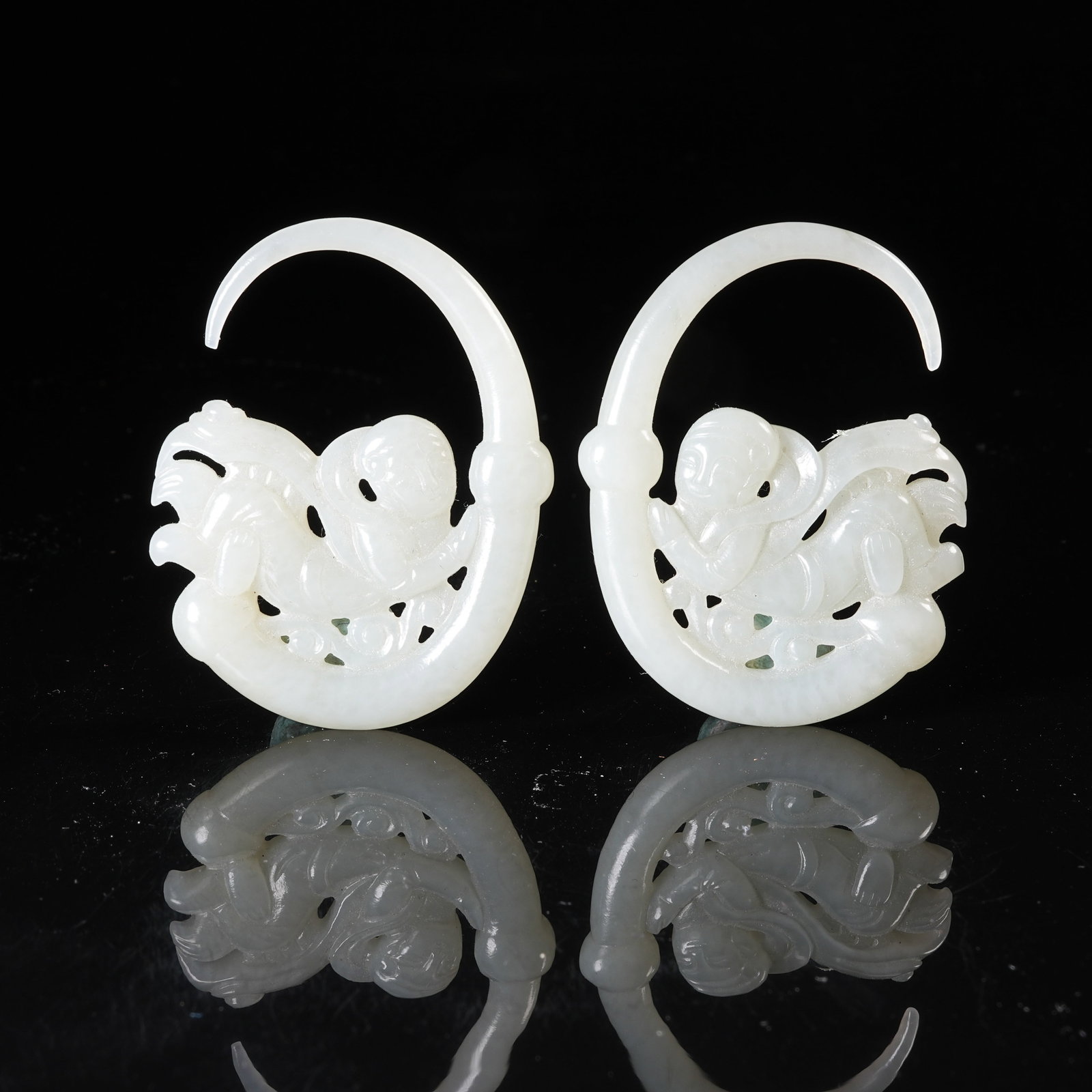 A HETIAN WHITE JADE "FEITIAN" (FLYING APSARAS) PENDANTS (SET) (1 of 8)