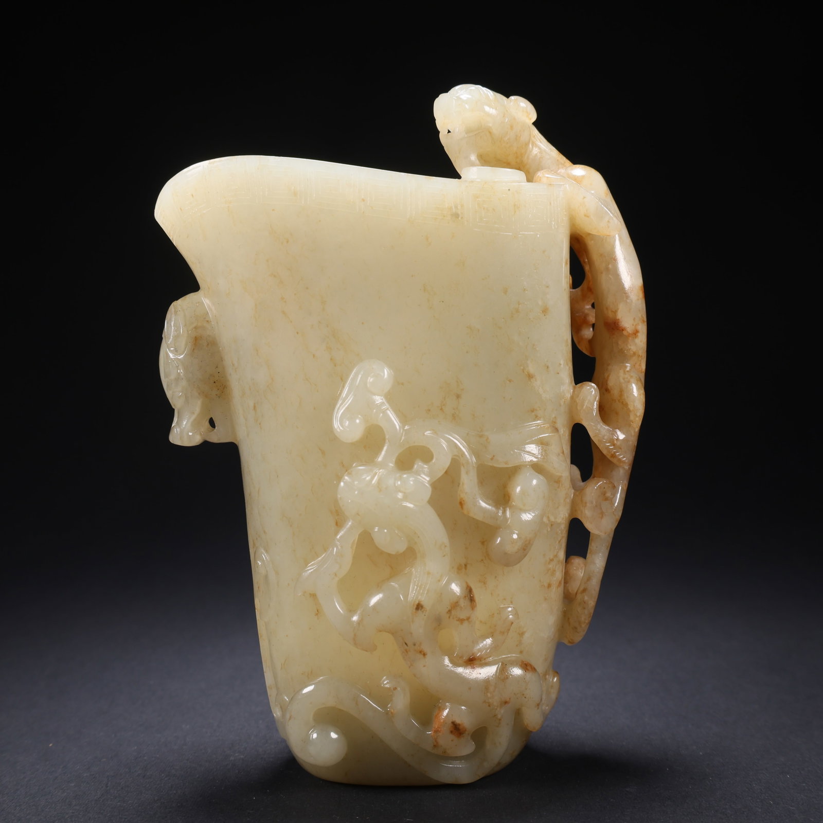 A HETIAN JADE HIGH-RELIEF THREE DRAGONS ON BEAST-HEAD HORN CUP (1 of 9)