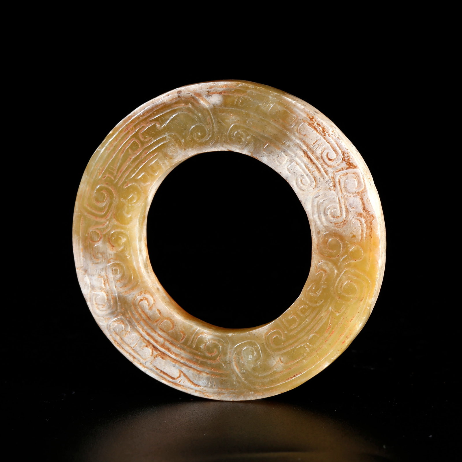 A HETIAN JADE CARVED BI DISC WITH ANIMAL MOTIFS (1 of 10)