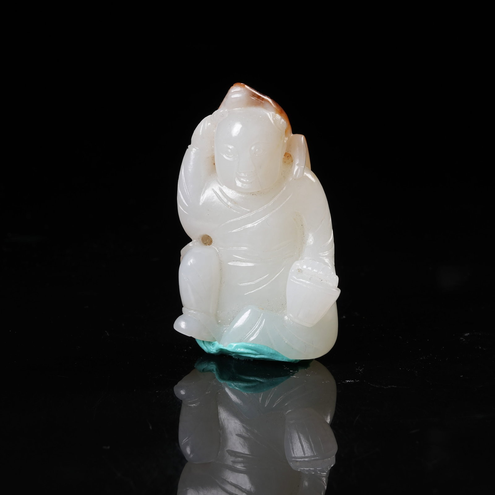 A HETIAN JADE BOY WITH BASKET ORNAMENT: Hetian Jade Boy with Basket Ornament