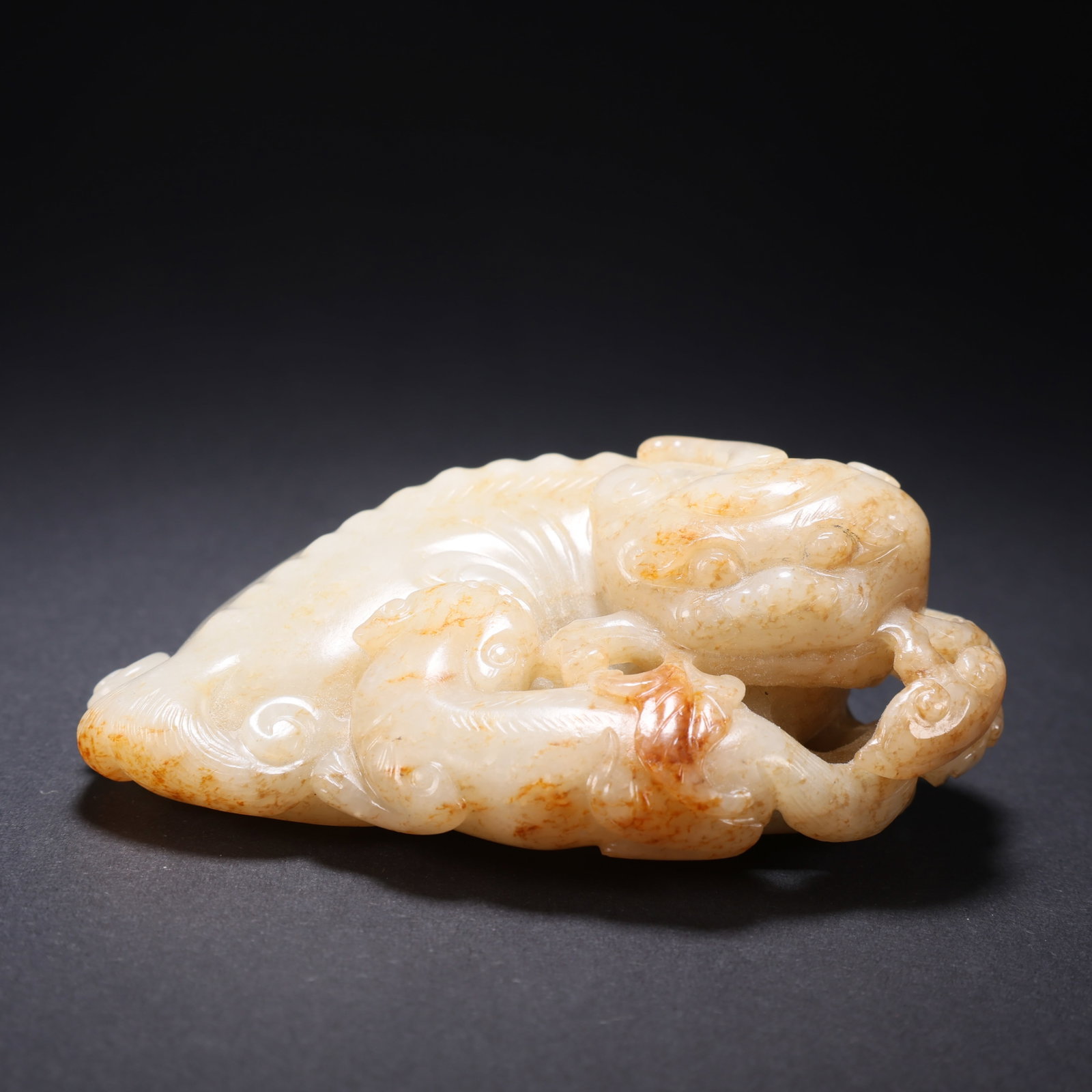 A HETIAN JADE MOTHER-AND-CHILD BEAST (1 of 9)