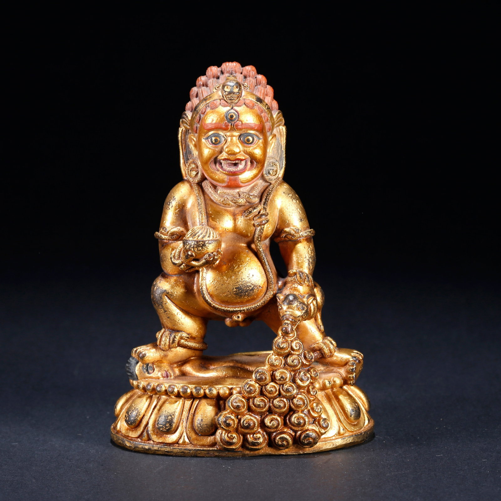 A GILT BRONZE GOD OF WEALTH STATUE (1 of 9)