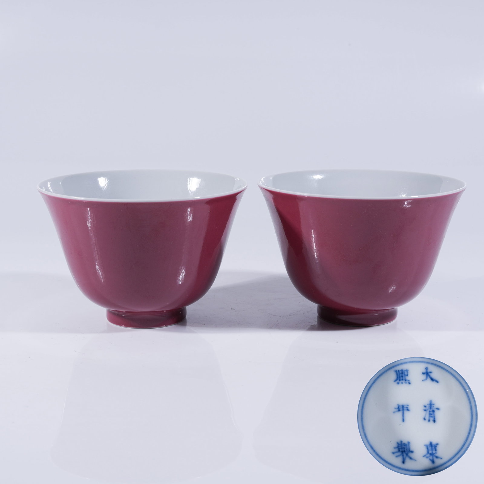 A SET OF CARMINE GLAZED CUPS (1 of 10)