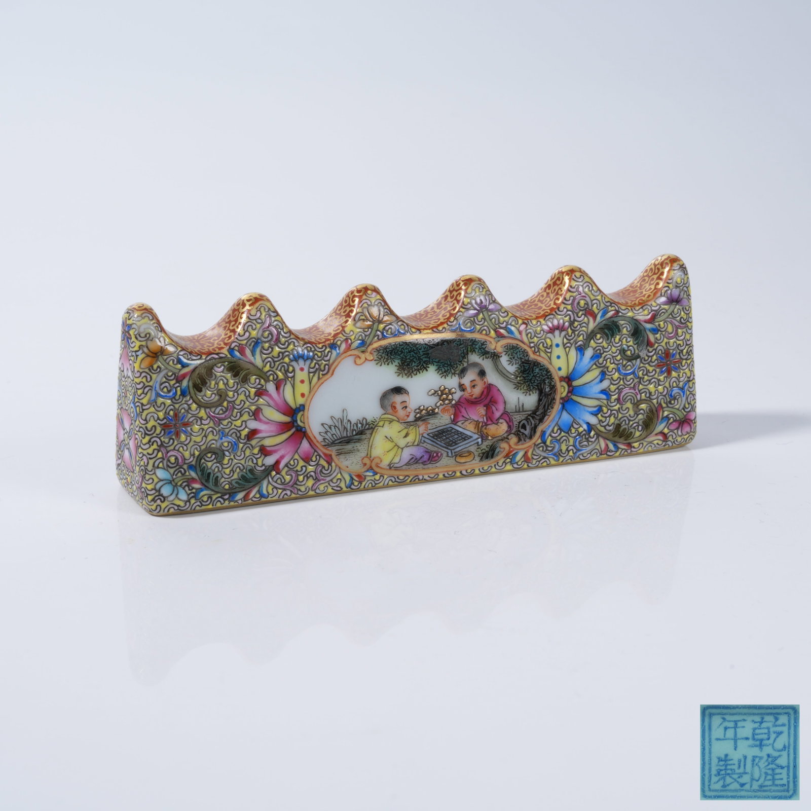 A FALANGCAI BRUSH REST WITH GO-PLAYING BOY PATTERN (1 of 9)