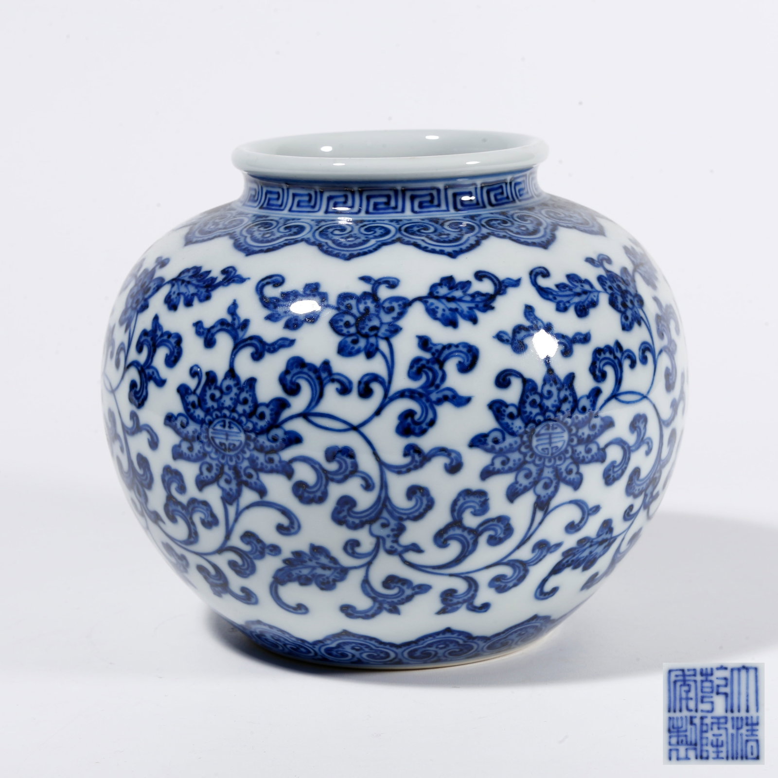 A BLUE AND WHITE JAR WITH INTERLOCKING FLORAL PATTERN (1 of 9)