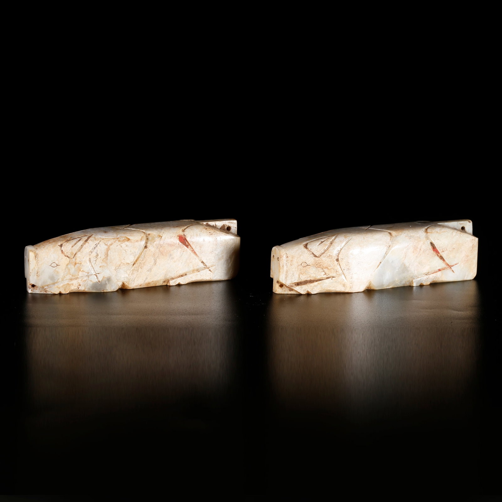 A HETIAN JADE CARVED ANIMAL-SHAPED ORNAMENTS (A PAIR) (1 of 11)