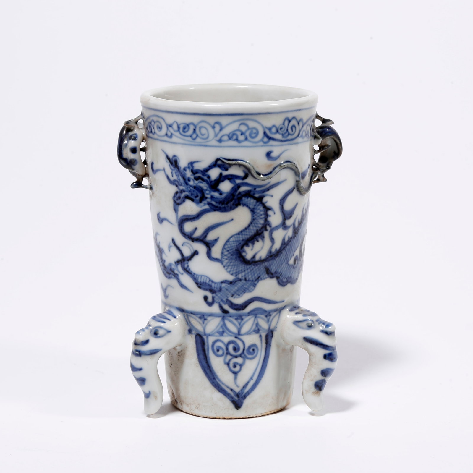 A BLUE AND WHITE TRIPOD BRUSH POT WITH CLOUD AND DRAGON PATTERN (1 of 9)