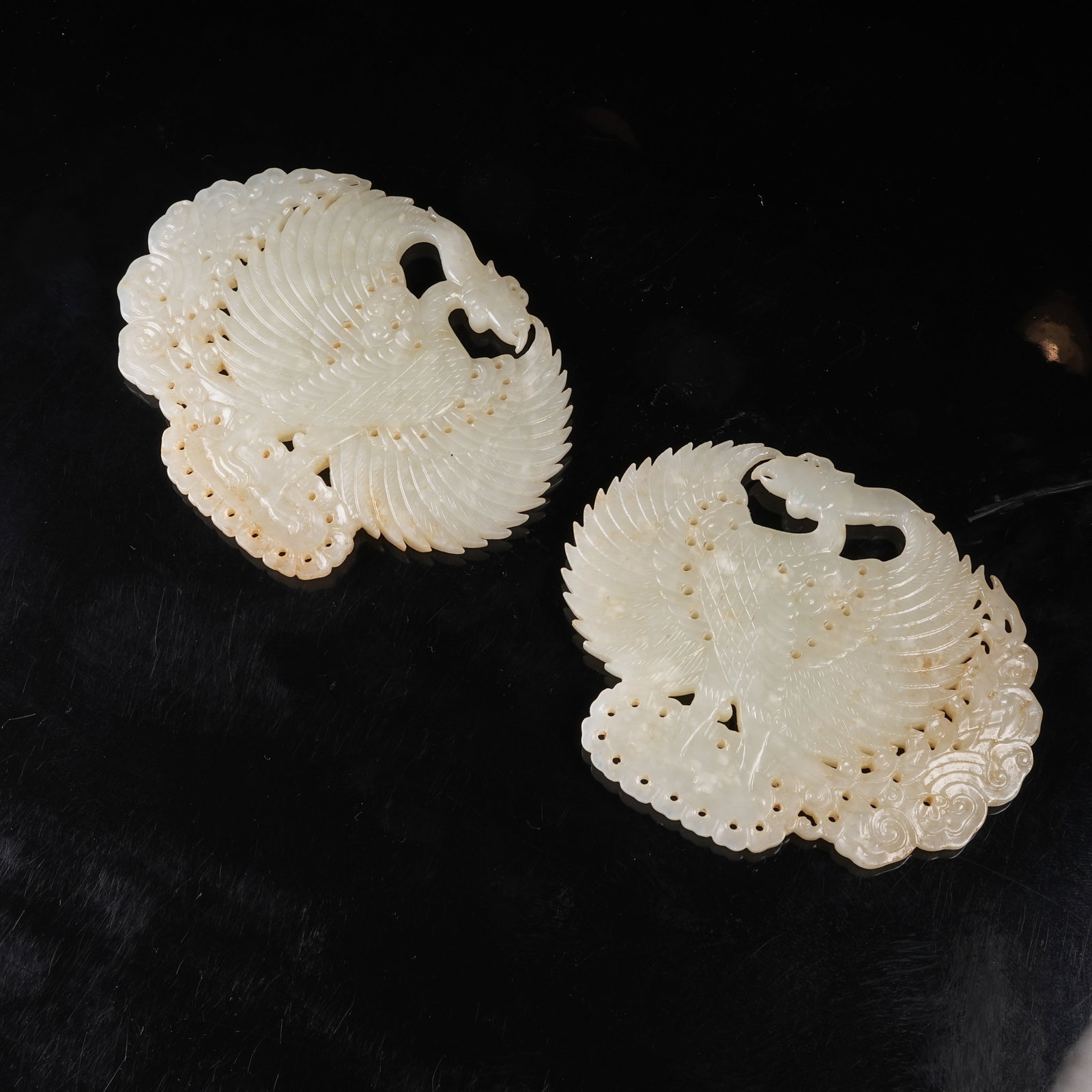 A HETIAN JADE DIVINE PHOENIX PENDANTS (SET) (1 of 8)