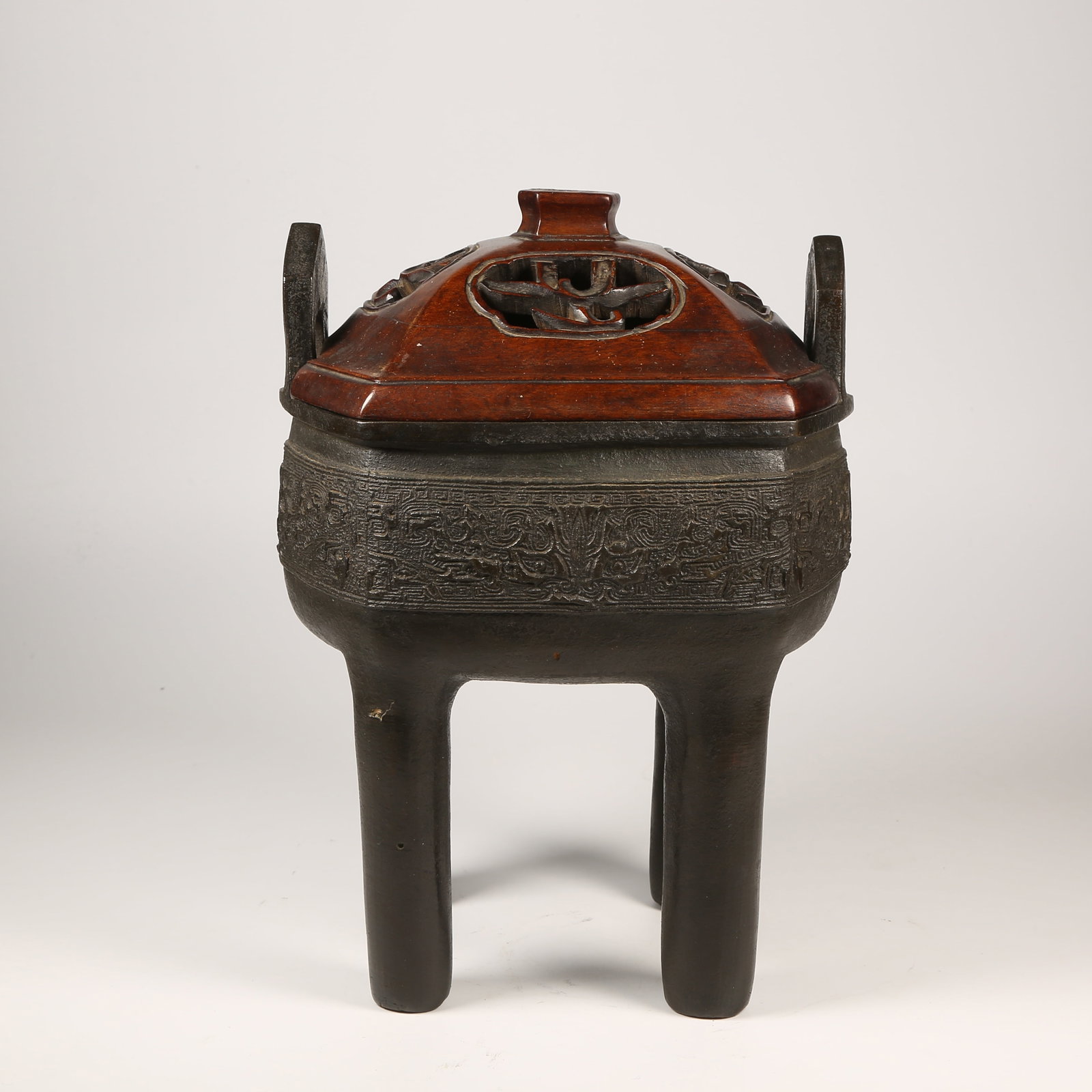 A BRONZE CENSER WITH ANIMAL-FACE MOTIFS, FOUR LEGS: Bronze Censer with Animal-Face Motifs, Four Legs