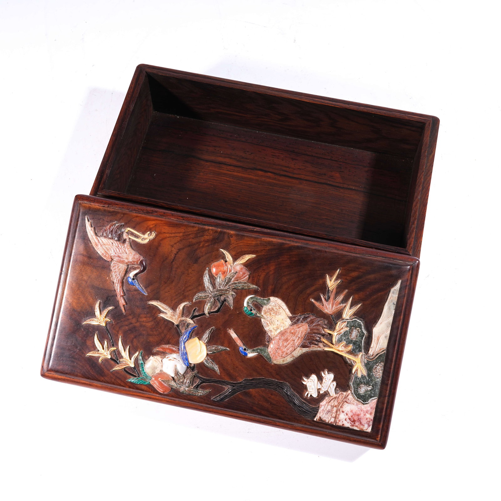 A COVERED BOX IN HUANGHUALI WOOD INLAID WITH PRECIOUS MATERIALS, DECORATED WITH "CRANES OFFERING: Covered Box in Huanghuali Wood Inlaid with Precious Materials, Decorated with "Cranes Offering Longevity" Motif