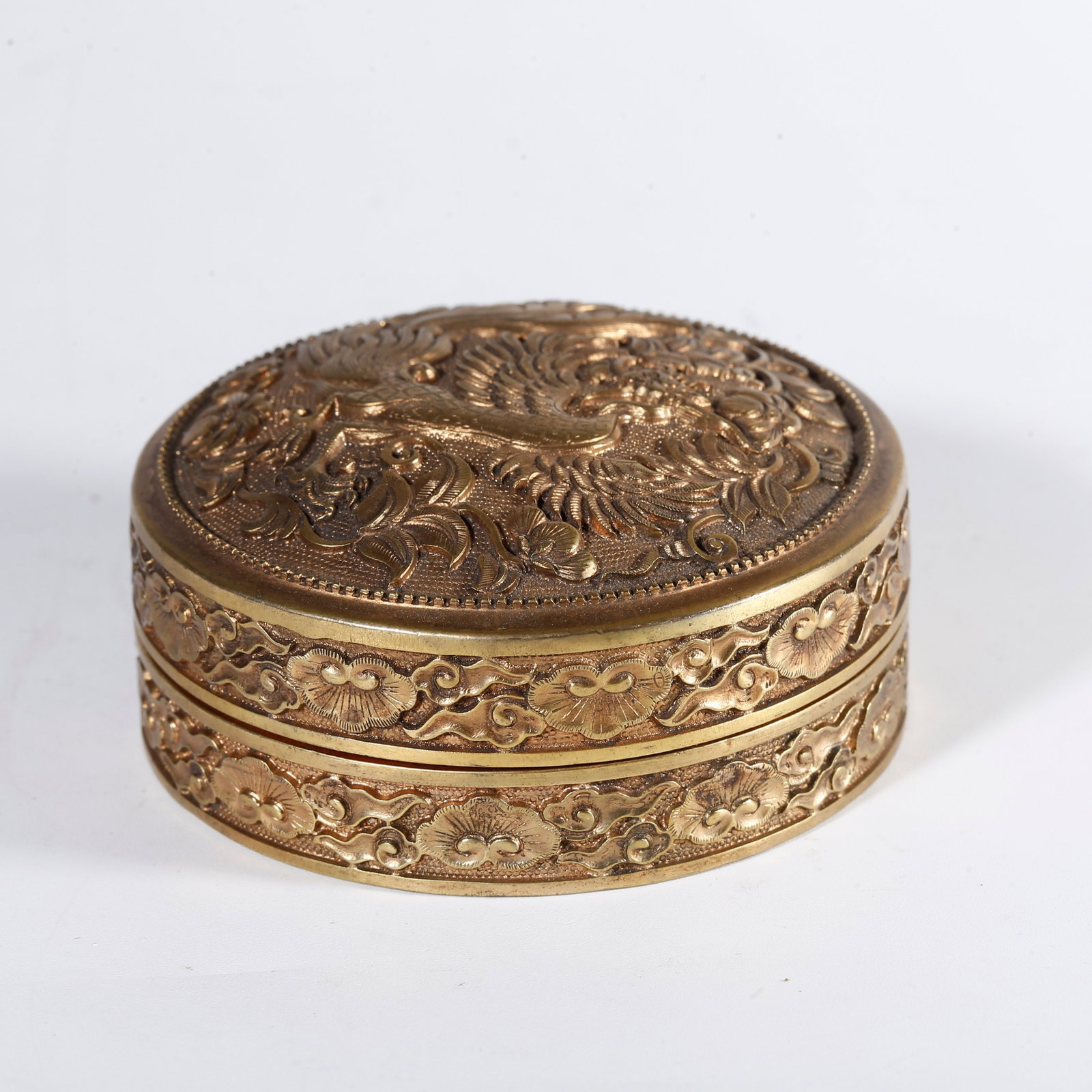 A GILT BRONZE COVERED BOX WITH PHOENIX INTERSPERSED FLORAL PATTERN (1 of 9)