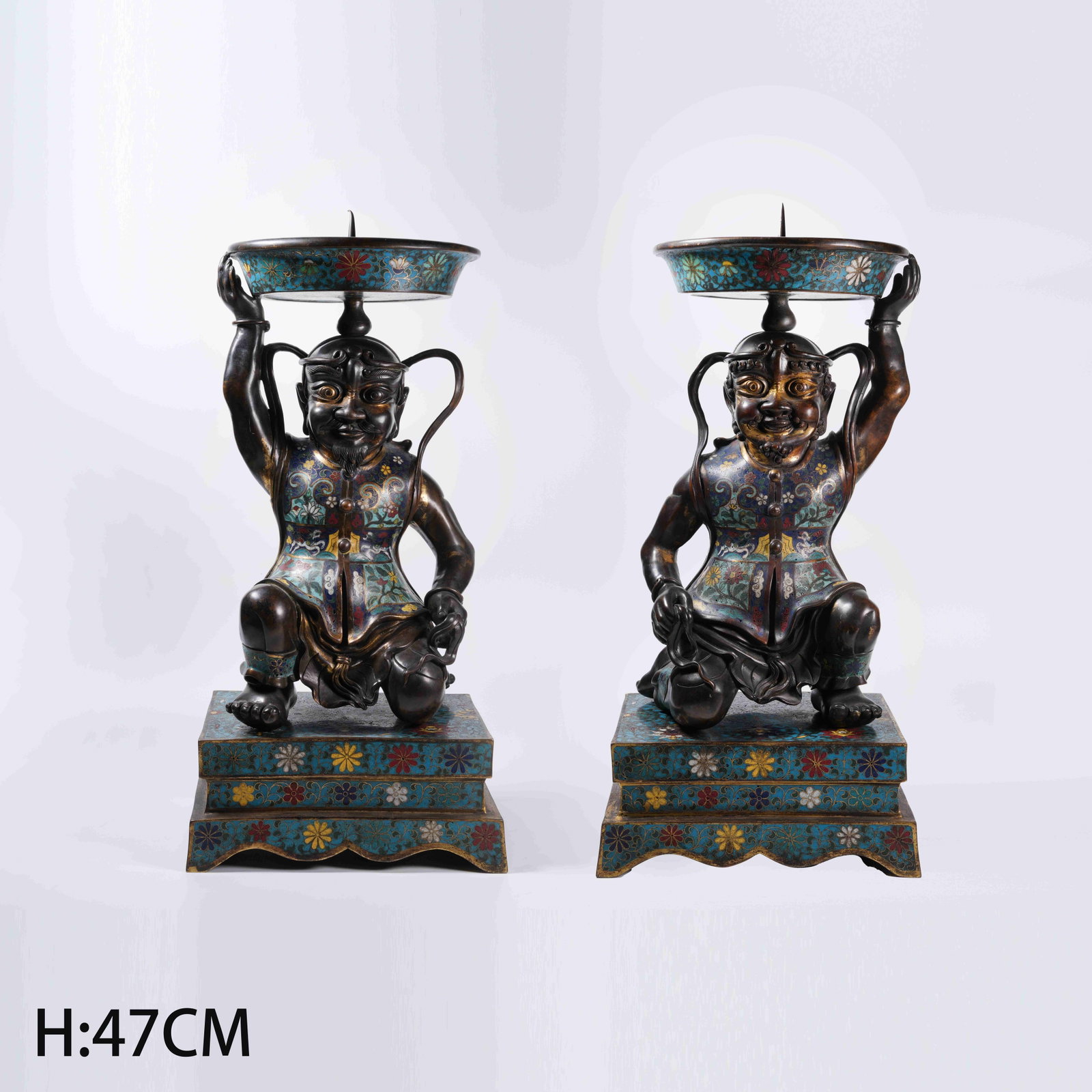 A SET OF CLOISONNÉ DIVINE FIGURE CANDLE STANDS WITH INTERLOCKING FLORAL PATTERN (1 of 14)