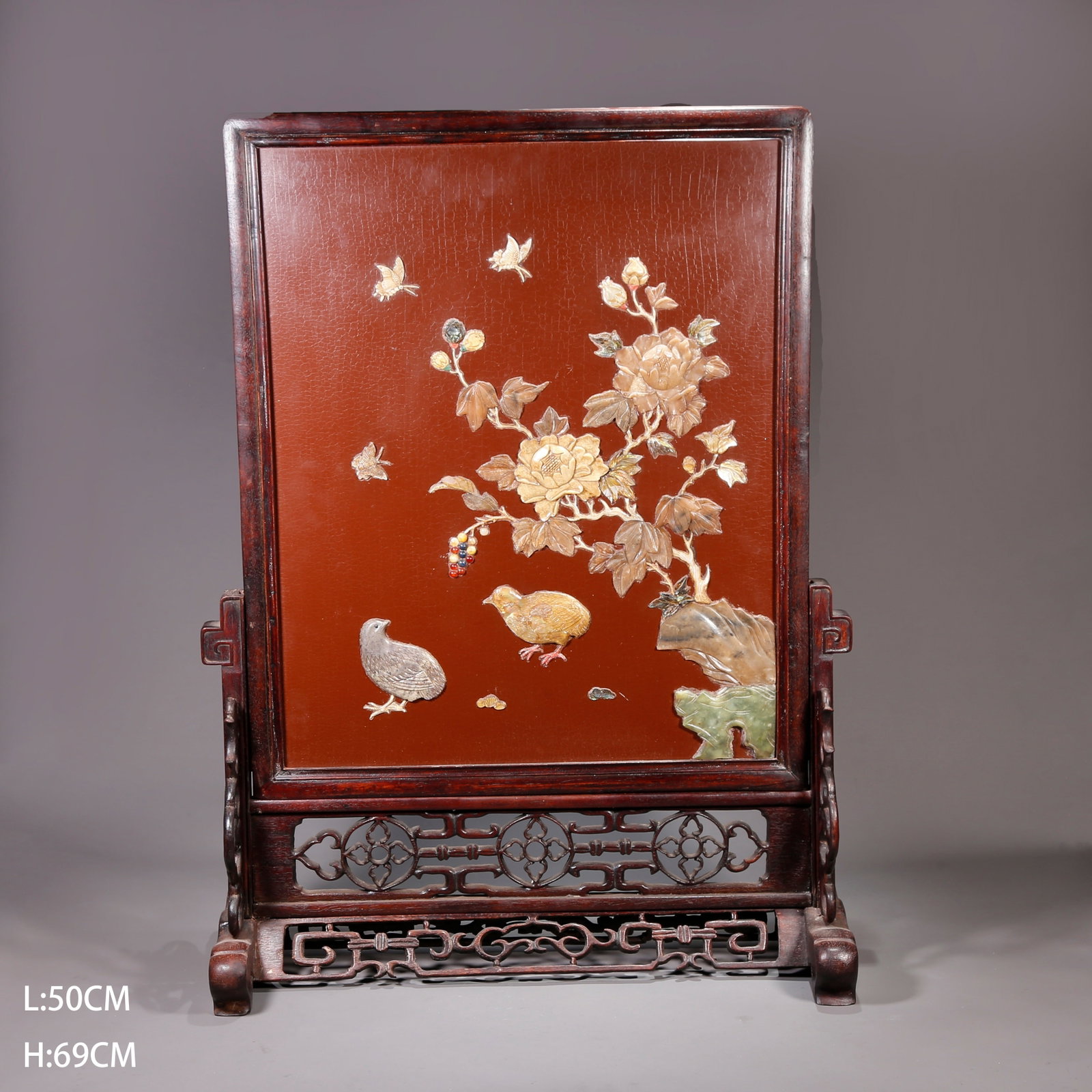A RED SANDALWOOD PRECIOUS STONE INLAID SCREEN WITH PEACE AND PROSPERITY PATTERN: Red Sandalwood Precious Stone Inlaid Screen with Peace and Prosperity Pattern