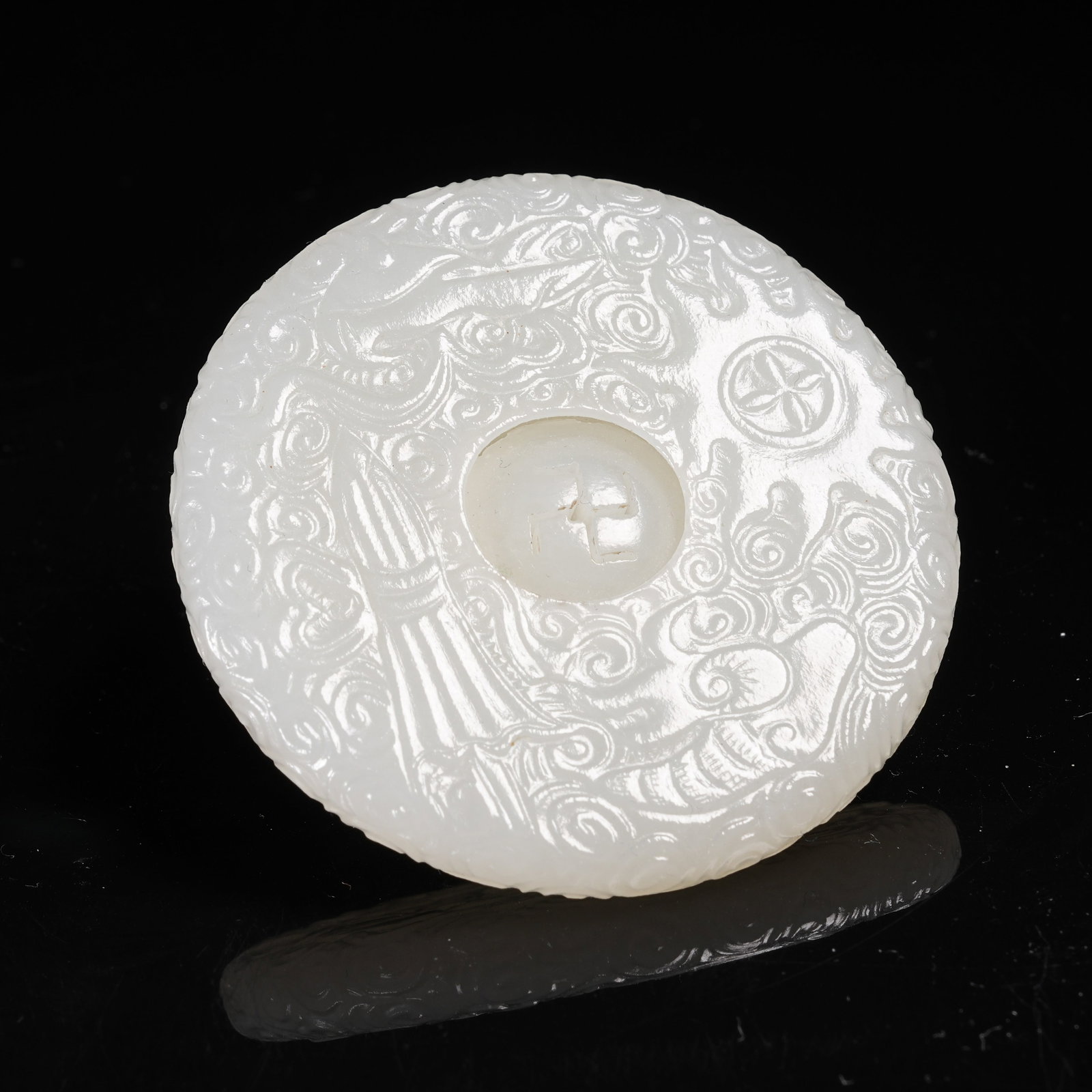 A HETIAN WHITE JADE PENDANT WITH EIGHT TREASURES MOTIF (1 of 11)