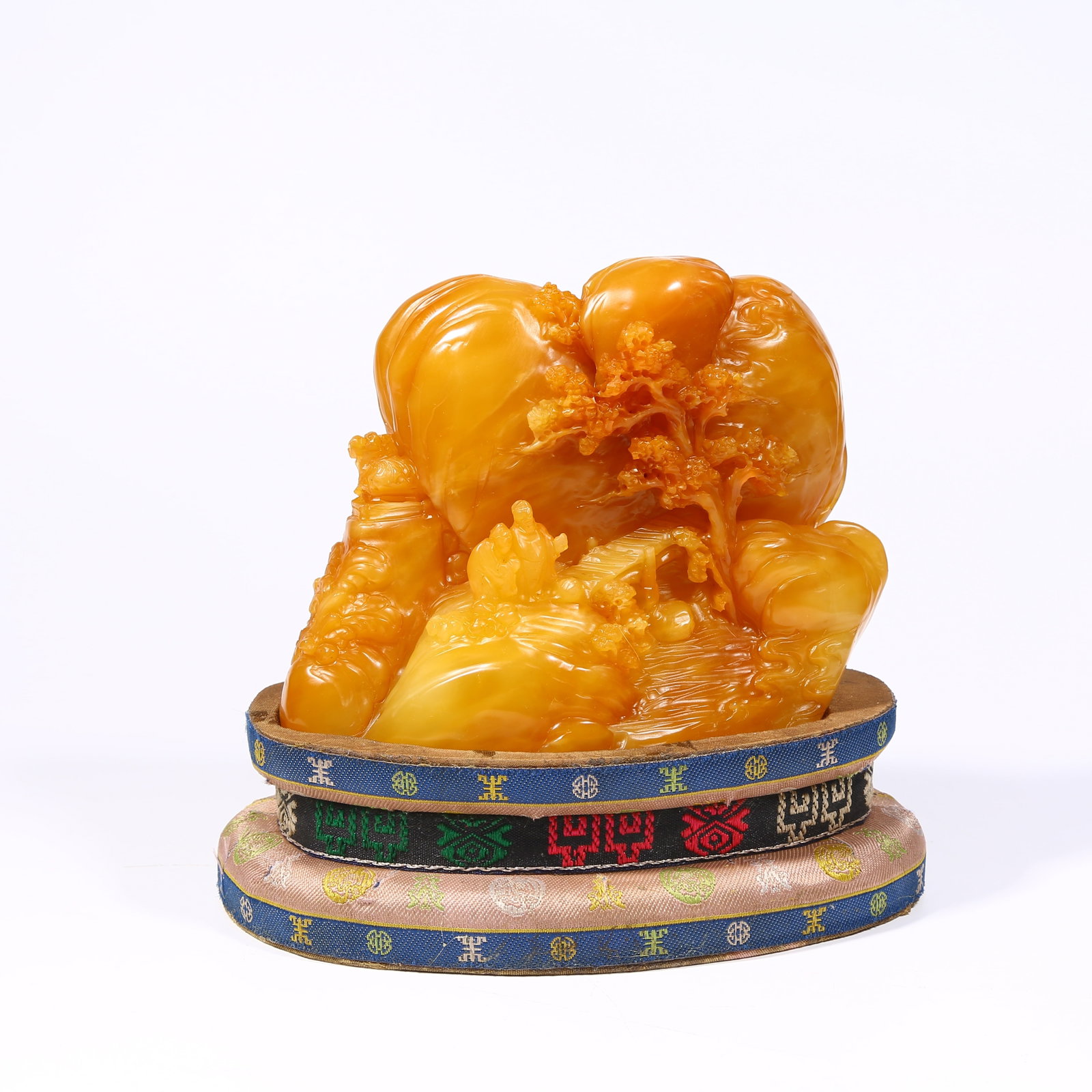 A SHOUSHAN TIANHUANG STONE SEAL CARVING OF A HIGH-RANKING SCHOLAR (SHANZI): Shoushan Tianhuang stone seal carving of a high-ranking scholar (shanzi)