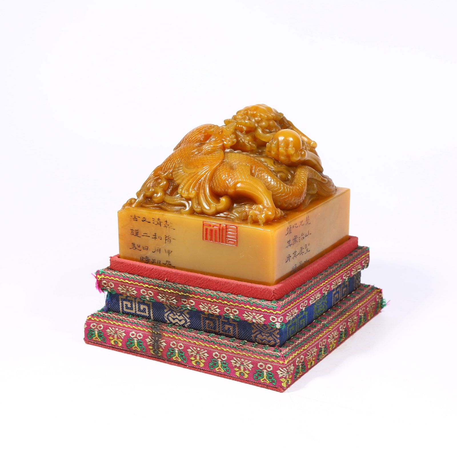 A SHOUSHAN TIANHUANG STONE SEAL WITH DRAGON AND PHOENIX KNOB: Shoushan Tianhuang stone seal with dragon and phoenix knob