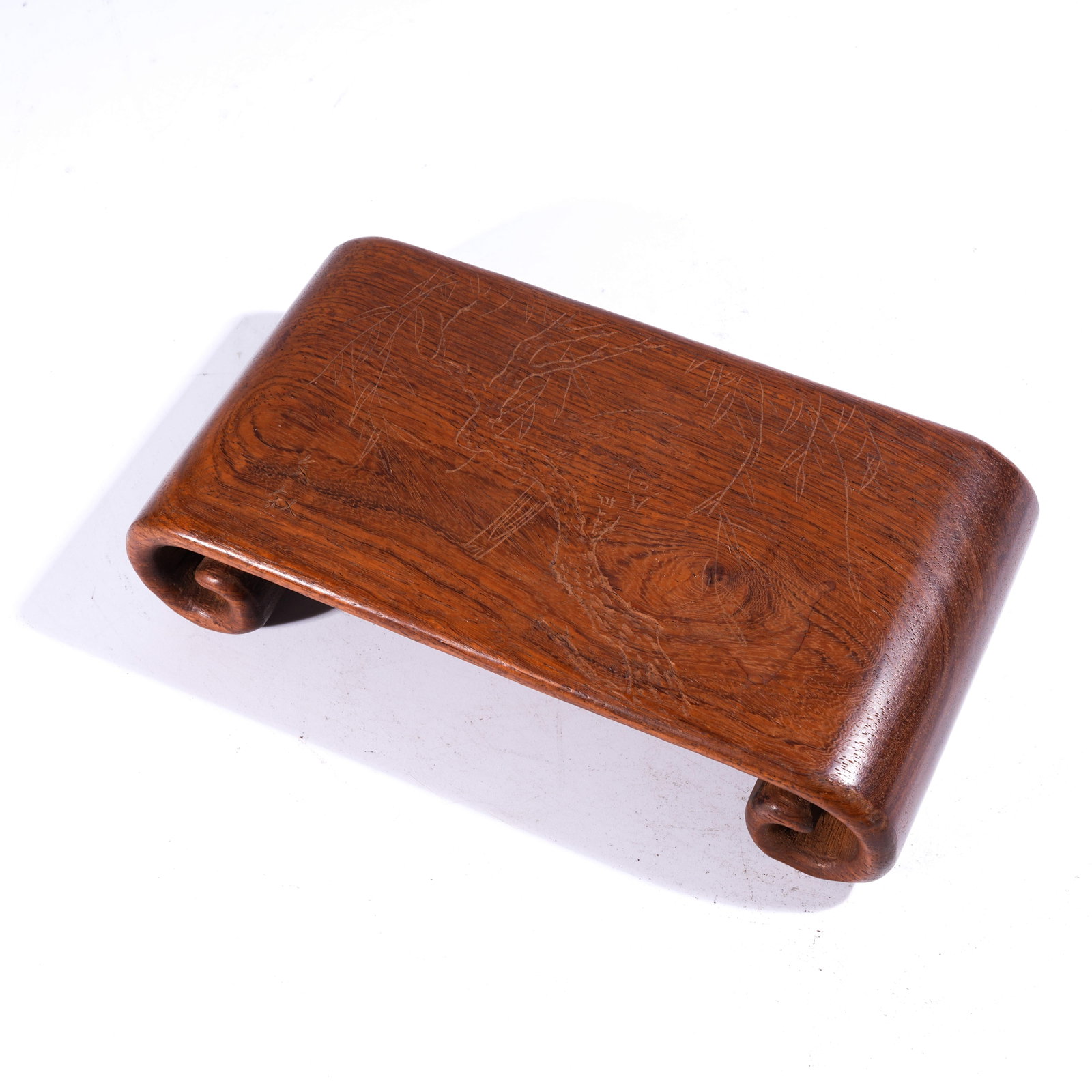 A SCROLL-END TABLE WITH FLOWER-AND-BIRD MOTIF IN HUANGHUALI WOOD: Scroll-End Table with Flower-and-Bird Motif in Huanghuali Wood