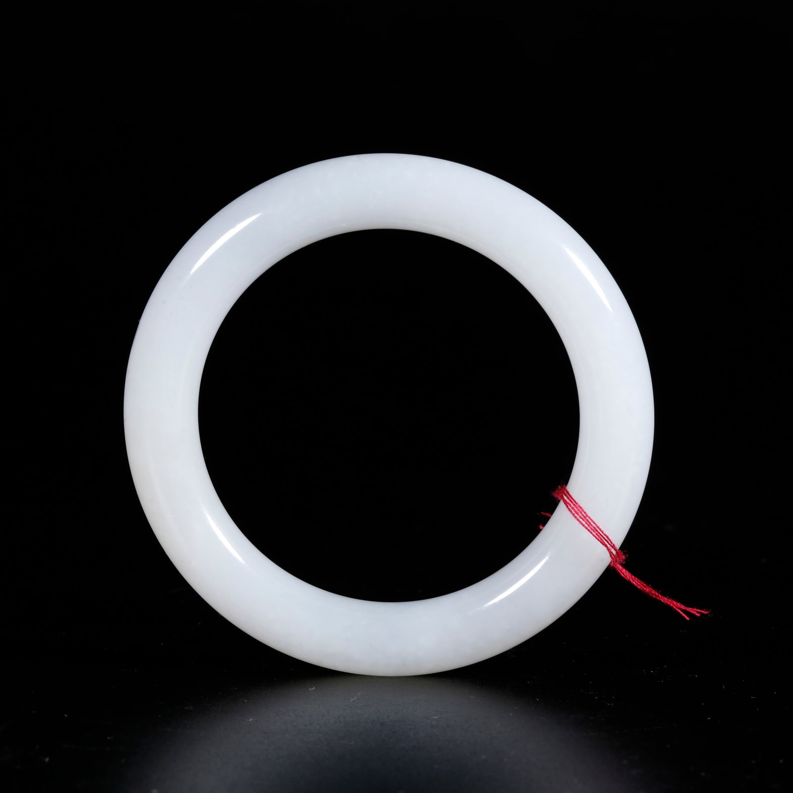 A HOTAN WHITE JADE CARVED BRACELET (1 of 9)