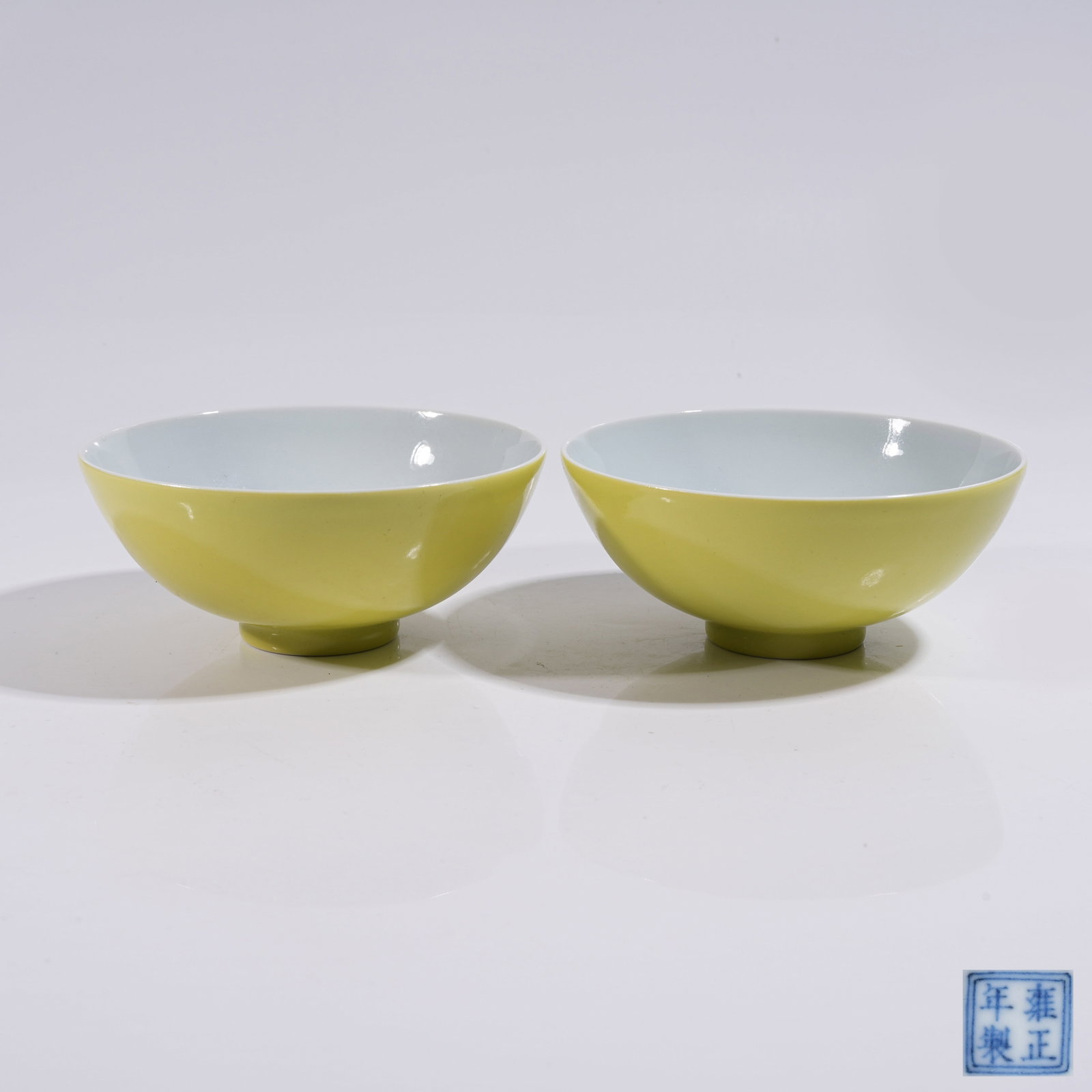 A SET OF LEMON YELLOW GLAZED BOWLS (1 of 9)