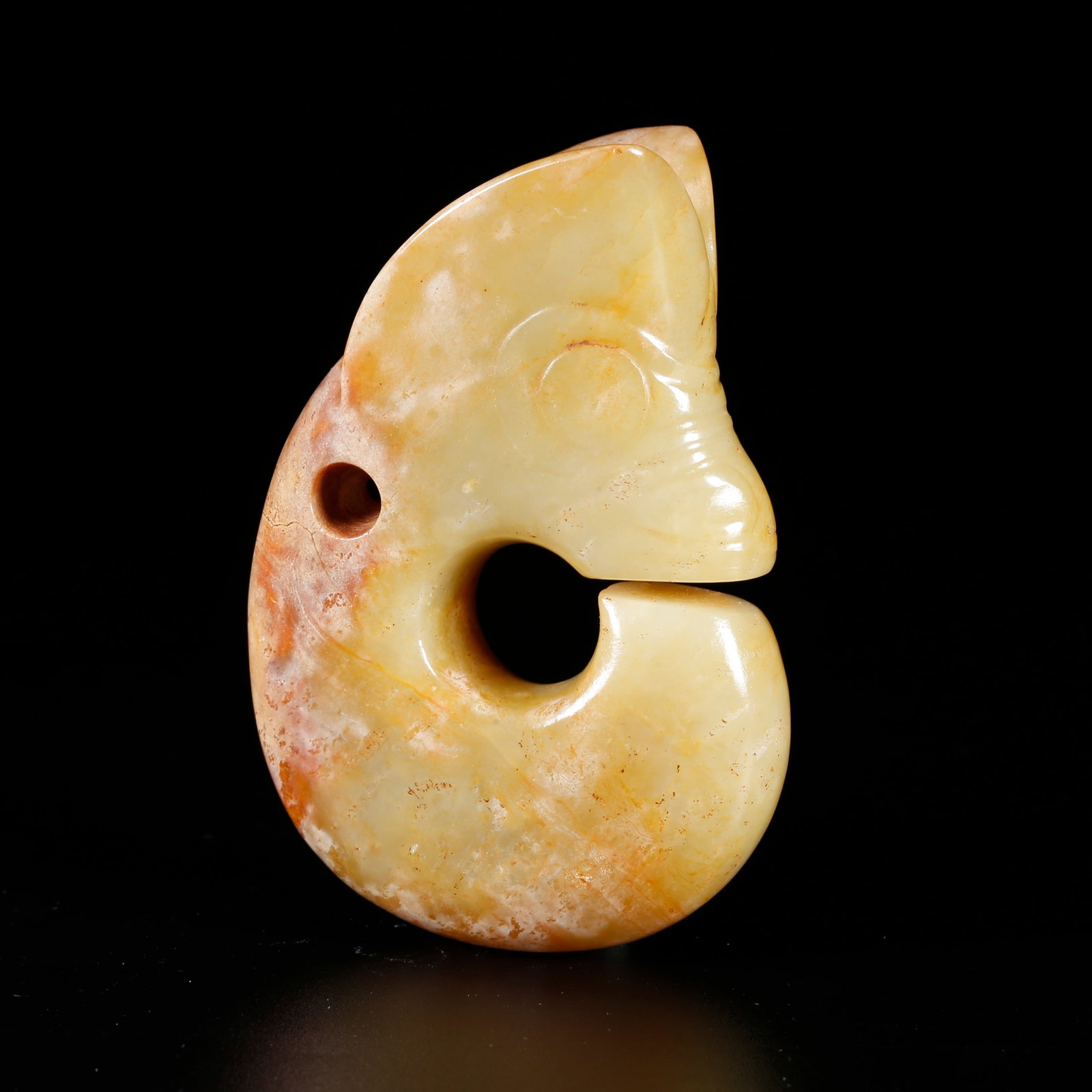 A ARCHAIC JADE CARVING OF A PIG-DRAGON (ZHULONG) (1 of 10)