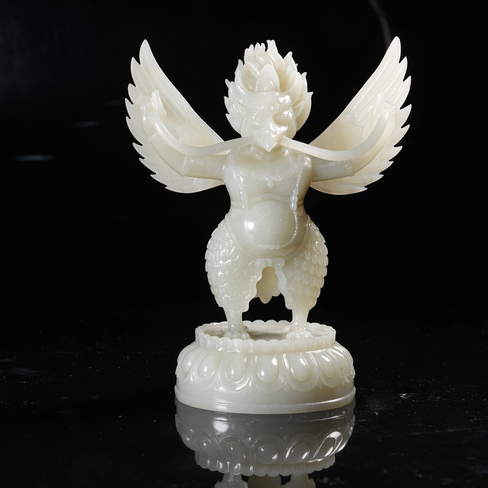 A HETIAN JADE GOLDEN-WINGED GARUDA BIRD ORNAMENT (1 of 9)