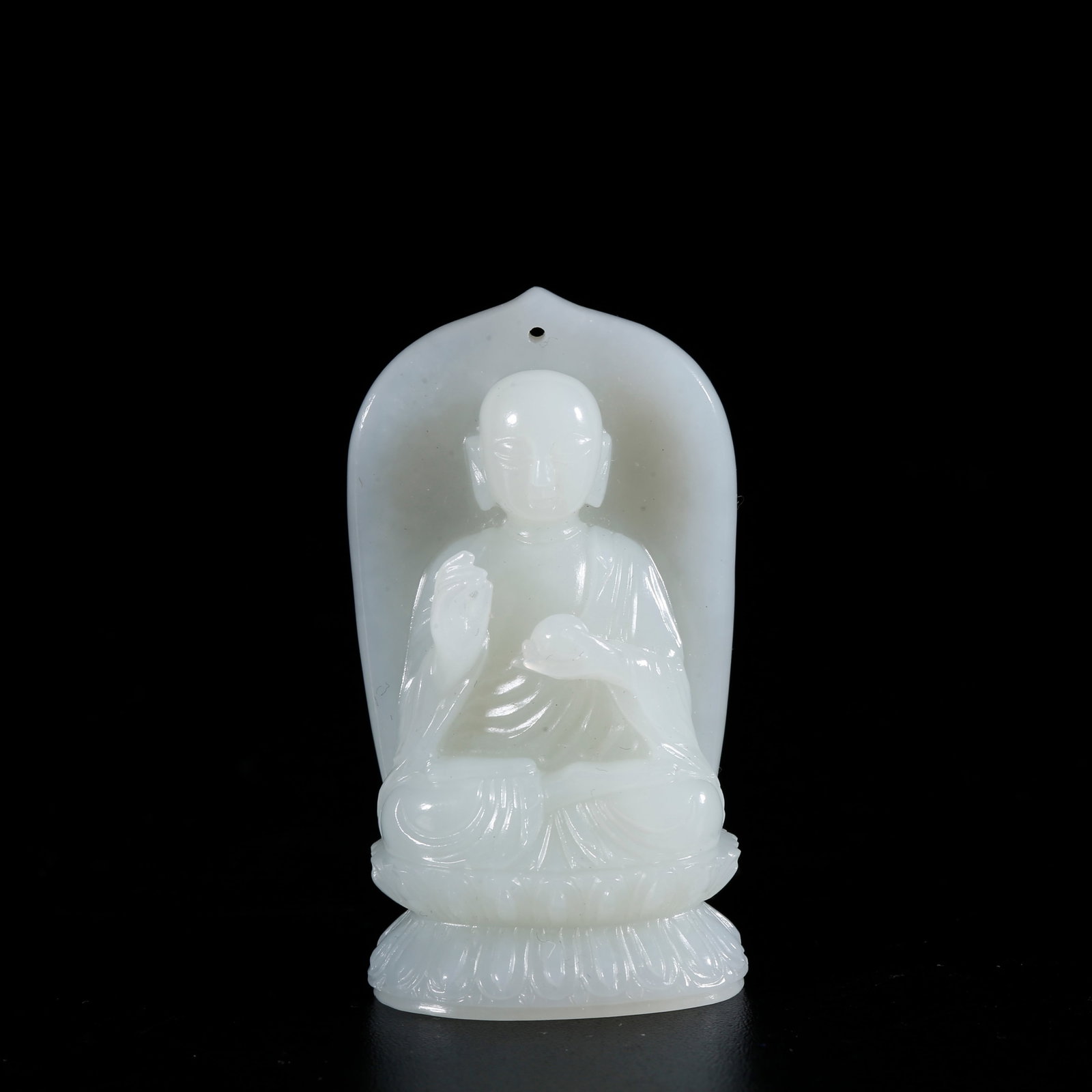 A HOTAN JADE CARVED BUDDHA PENDANT (1 of 9)