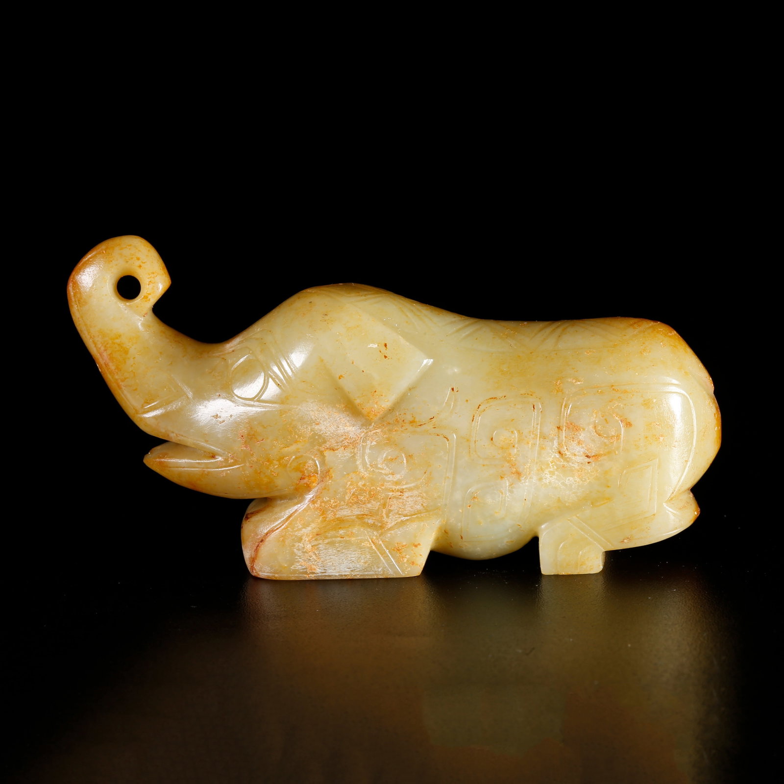 A HETIAN JADE CARVED ANIMAL-SHAPED ORNAMENT (1 of 10)
