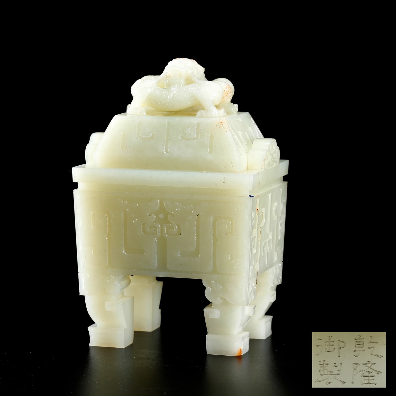 A HETIAN JADE TRIPOD WITH BEAST MASK PATTERN AND DRAGON KNOB (1 of 8)