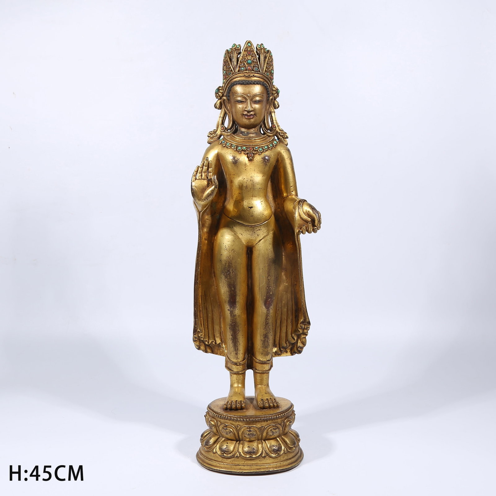 A GILT BRONZE STANDING CROWNED SHAKYAMUNI STATUE: Gilt Bronze Standing Crowned Shakyamuni Statue