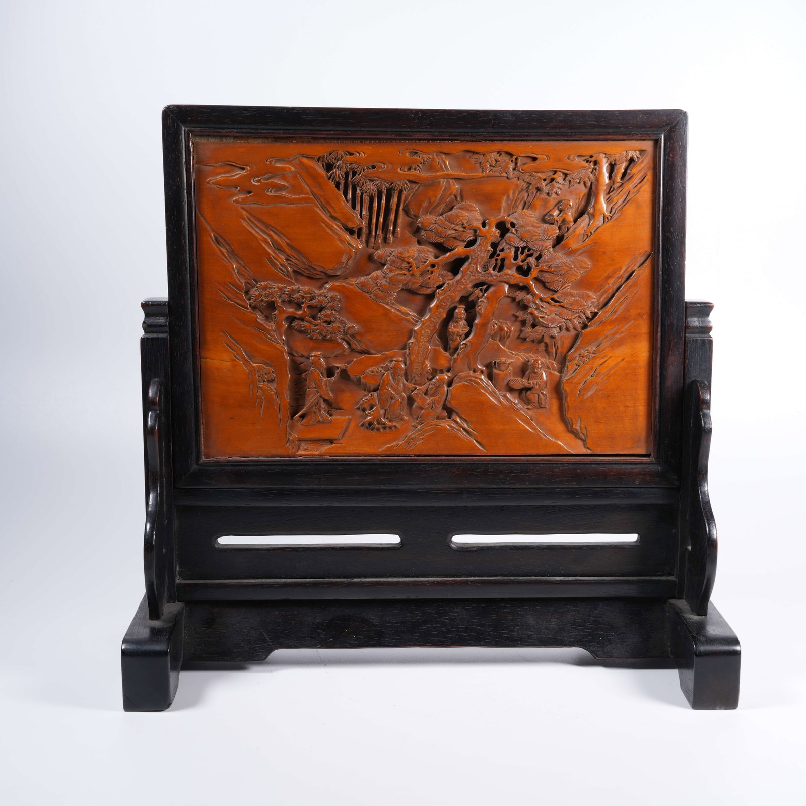 A RED SANDALWOOD SCREEN INLAID WITH BOXWOOD CARVED WITH SAGES UNDER PINES PATTERN: Red Sandalwood Screen Inlaid with Boxwood Carved with Sages Under Pines Pattern