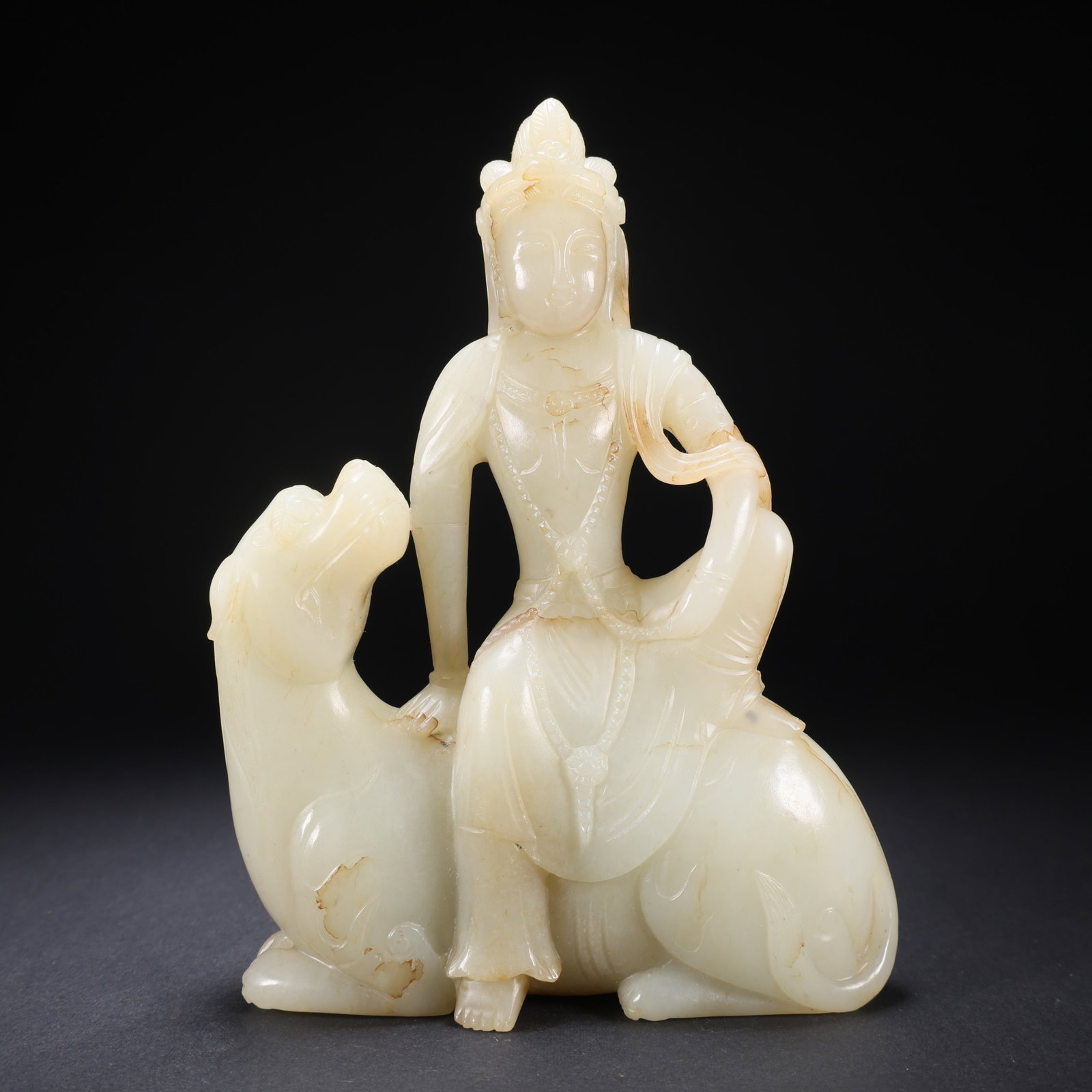 A HETIAN JADE GUANYIN RIDING A LION (1 of 9)