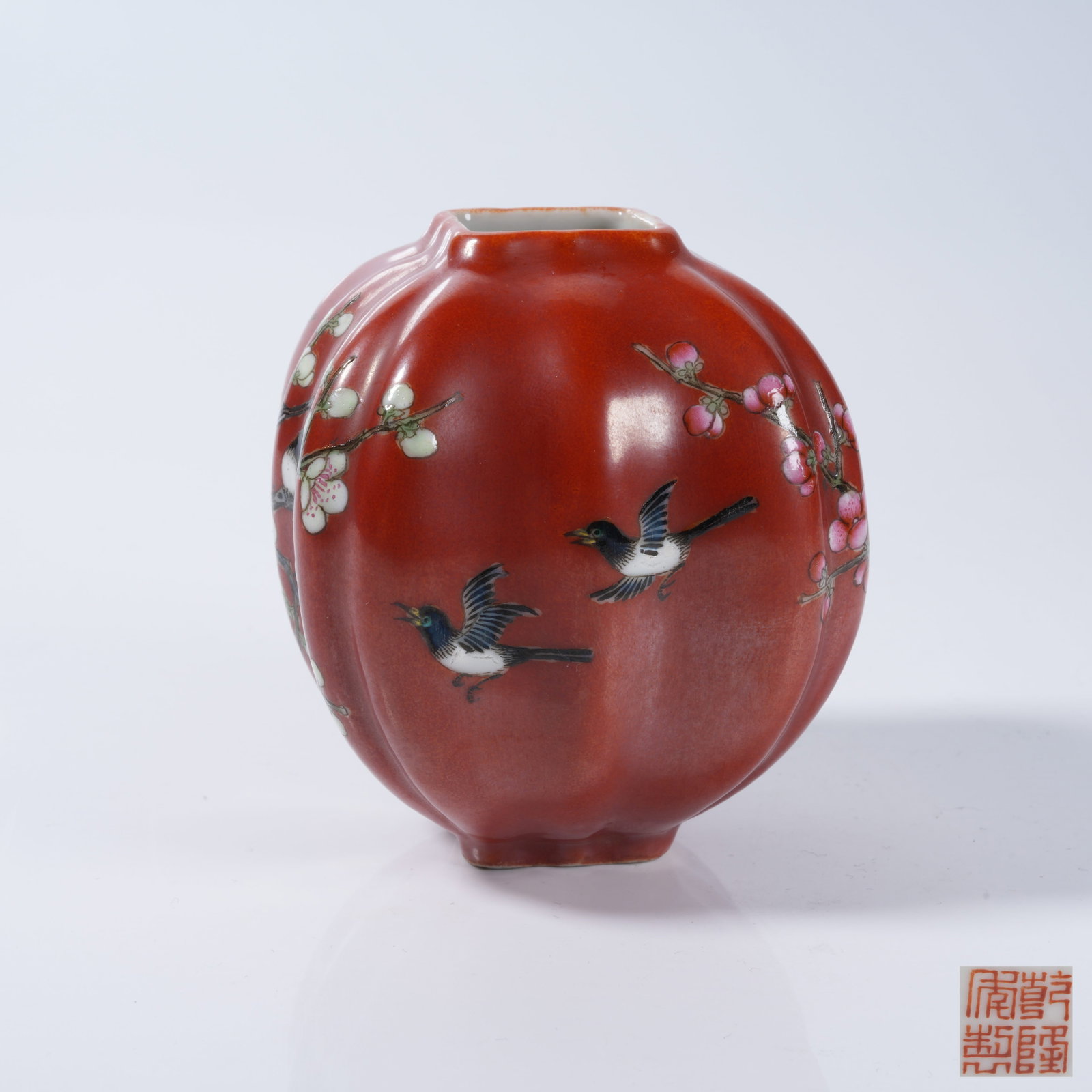 A FAMILLE ROSE MELON-RIBBED JAR WITH MAGPIE ON PLUM BRANCH PATTERN (1 of 9)