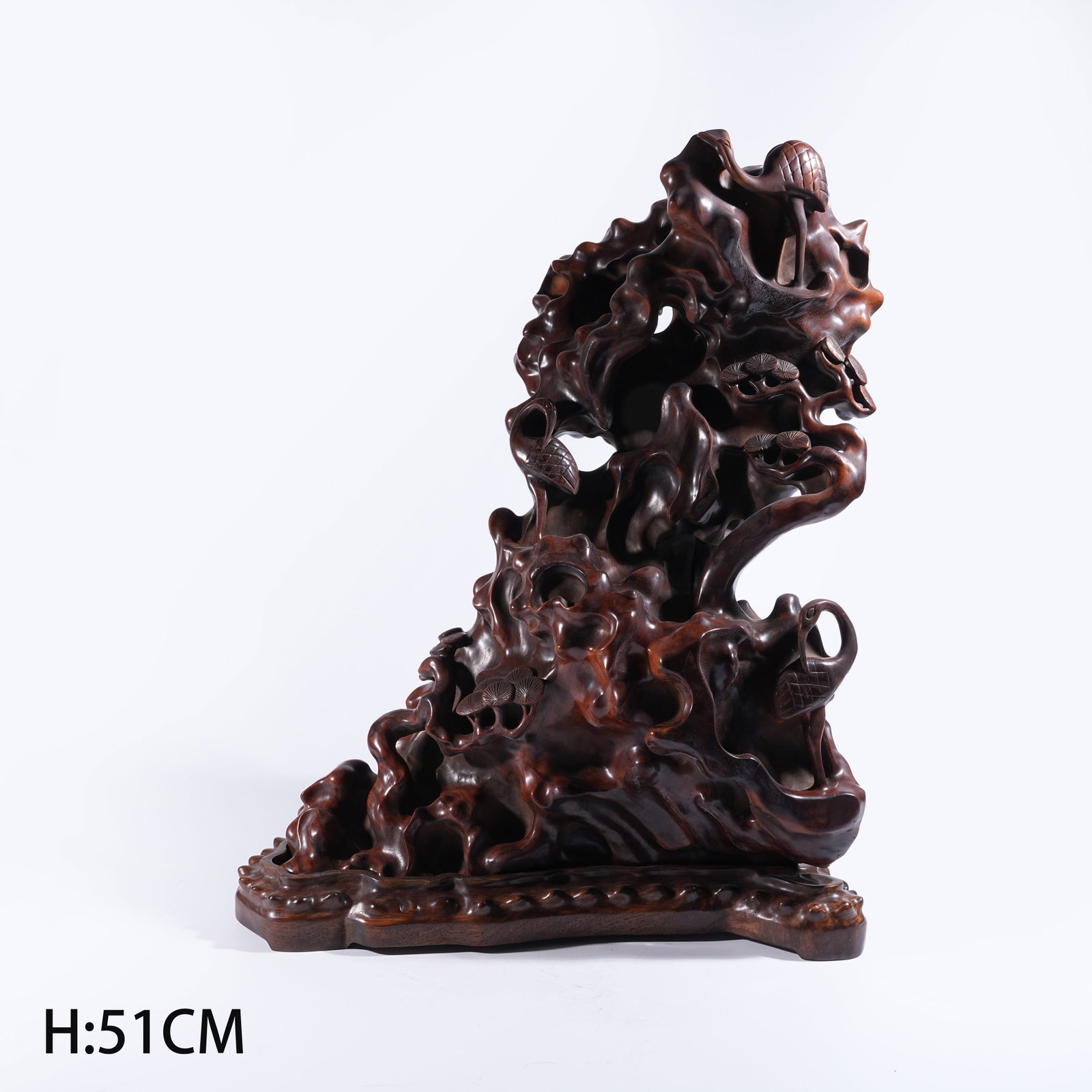 A MOUNTAIN-FORM ORNAMENT WITH "PINE AND CRANE LONGEVITY" MOTIF IN HUANGHUALI WOOD (1 of 9)