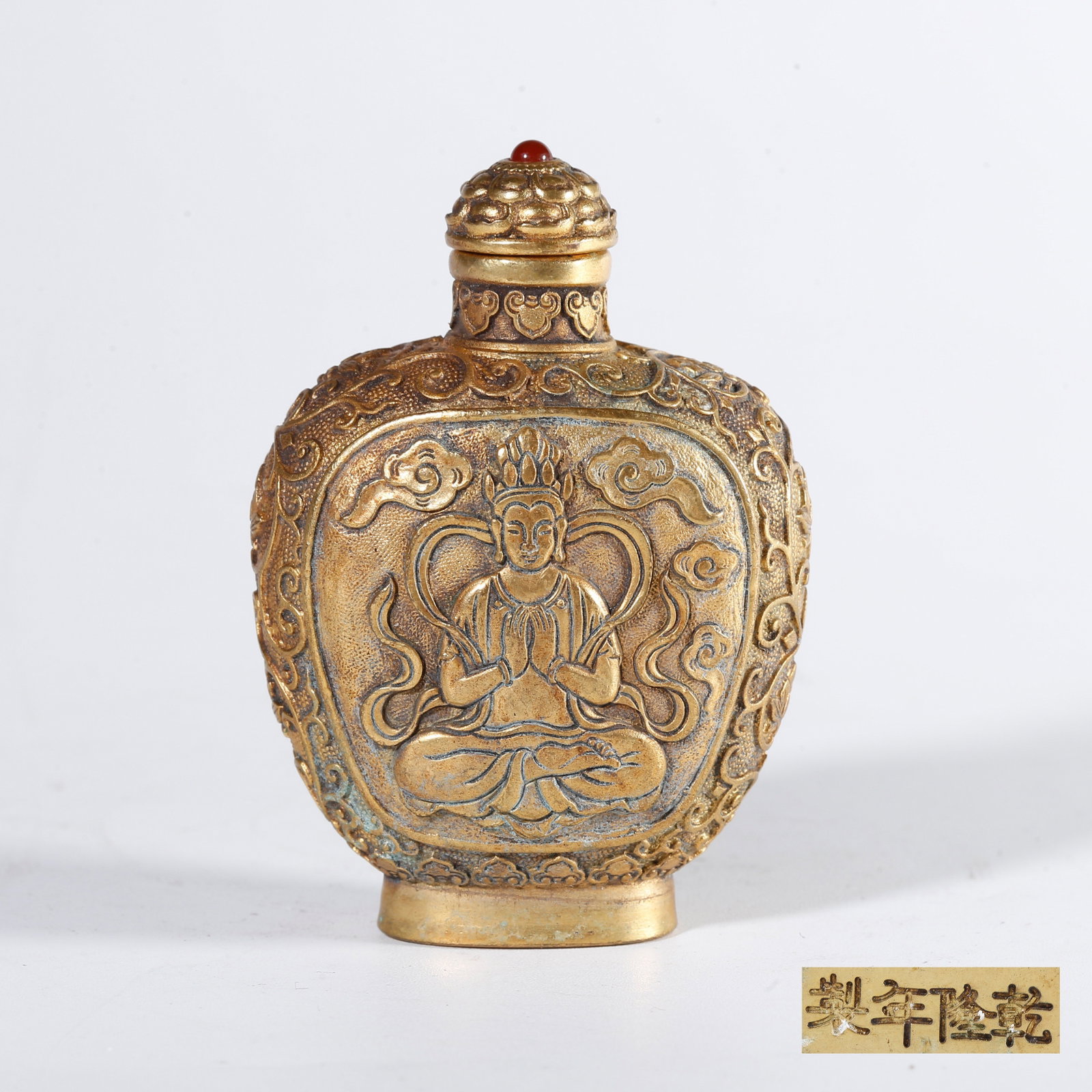 A GILT BRONZE SNUFF BOTTLE WITH BUDDHA PATTERN (1 of 9)